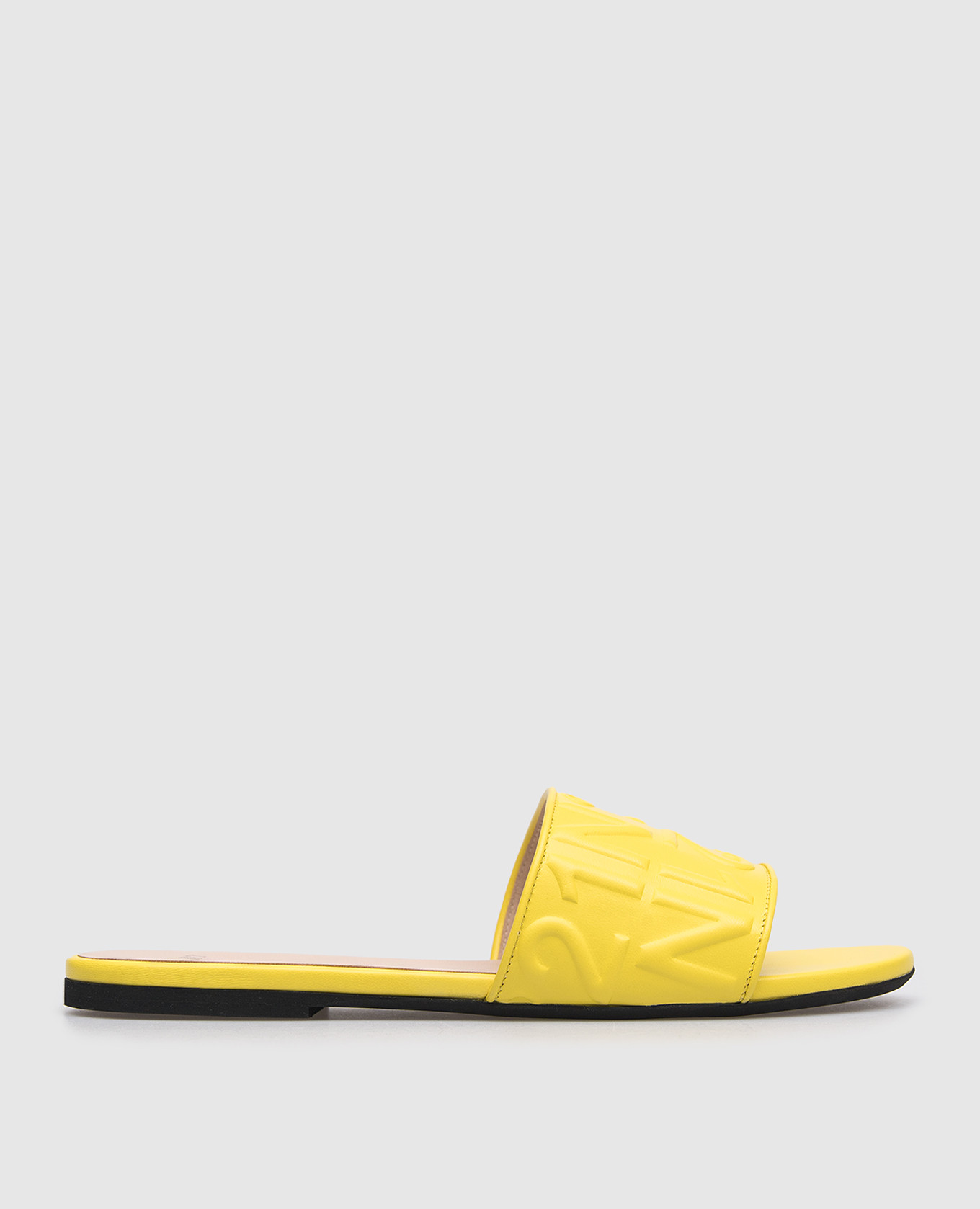 Yellow leather flip flops with embossed logo