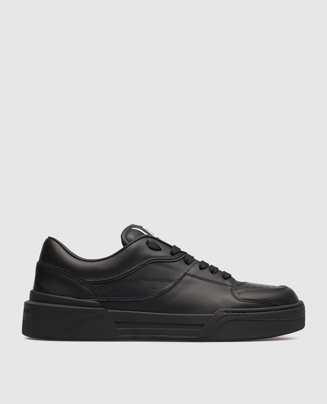 Black leather sneakers from New Roma with logo patch
