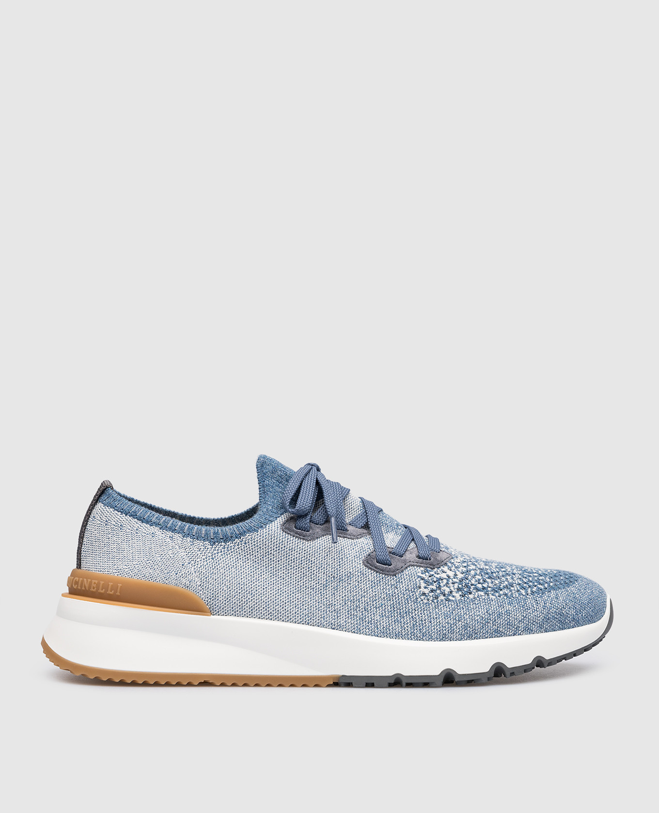 Blue sneakers with a textured logo