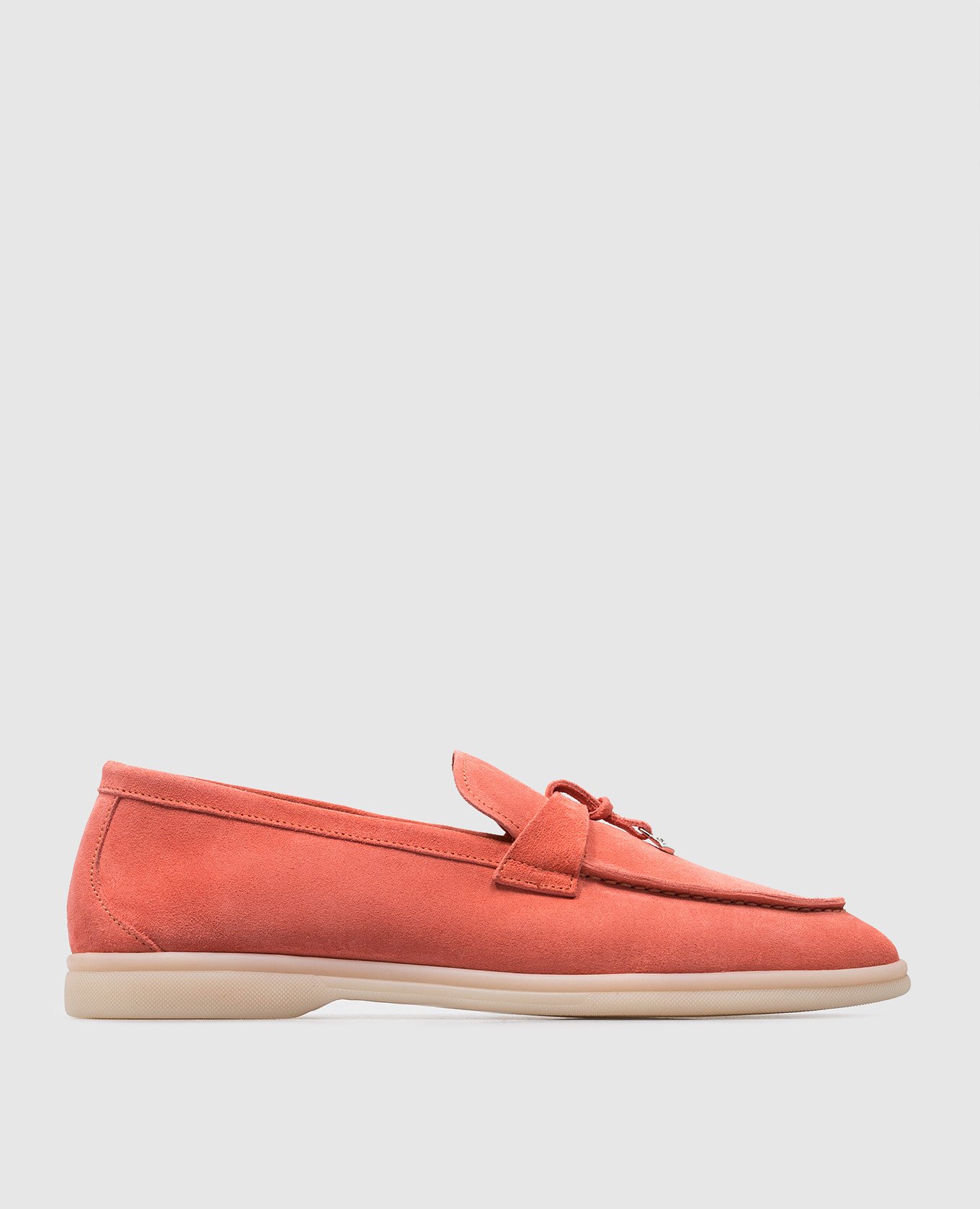 Pink suede loafers with metallic logo