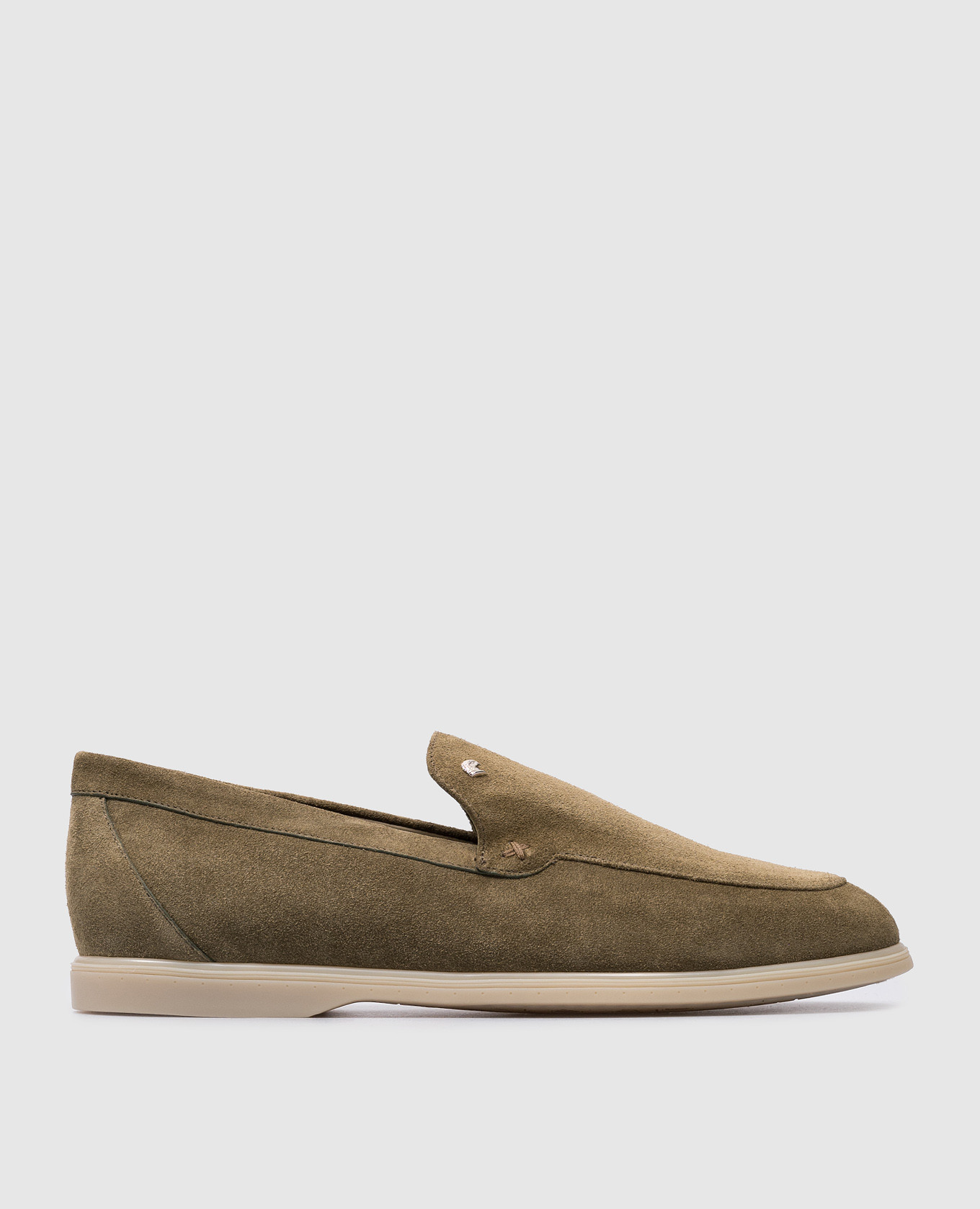 Green suede loafers with metallic logo patch