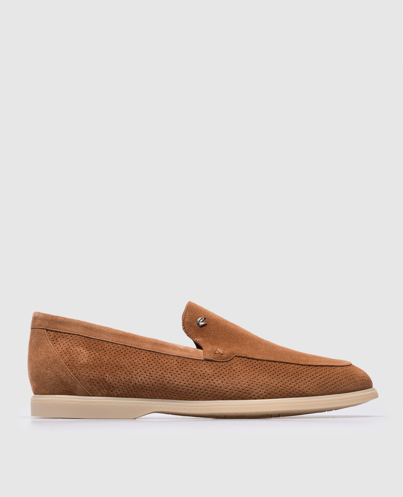 Brown suede loafers with metallic logo patch
