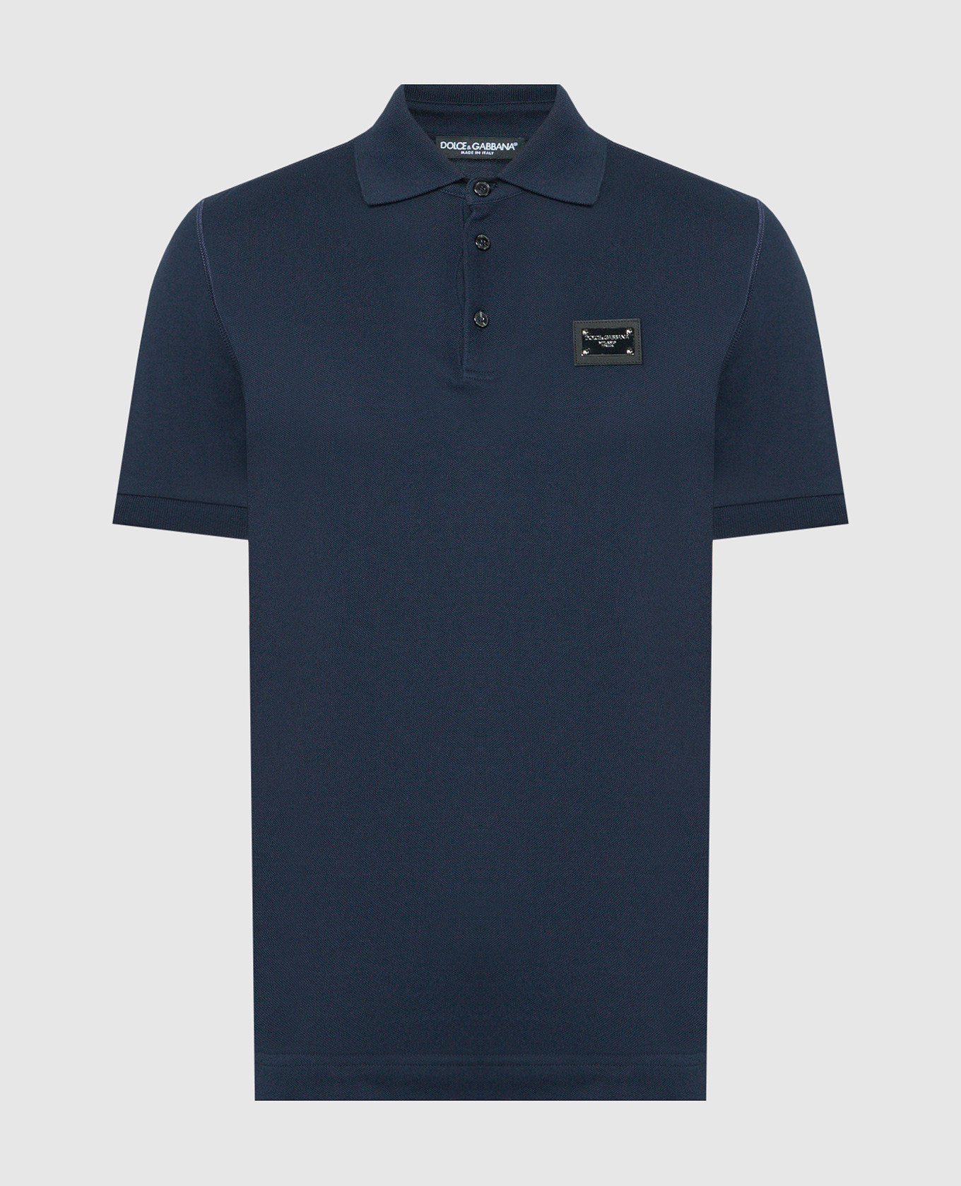 Blue polo with logo patch
