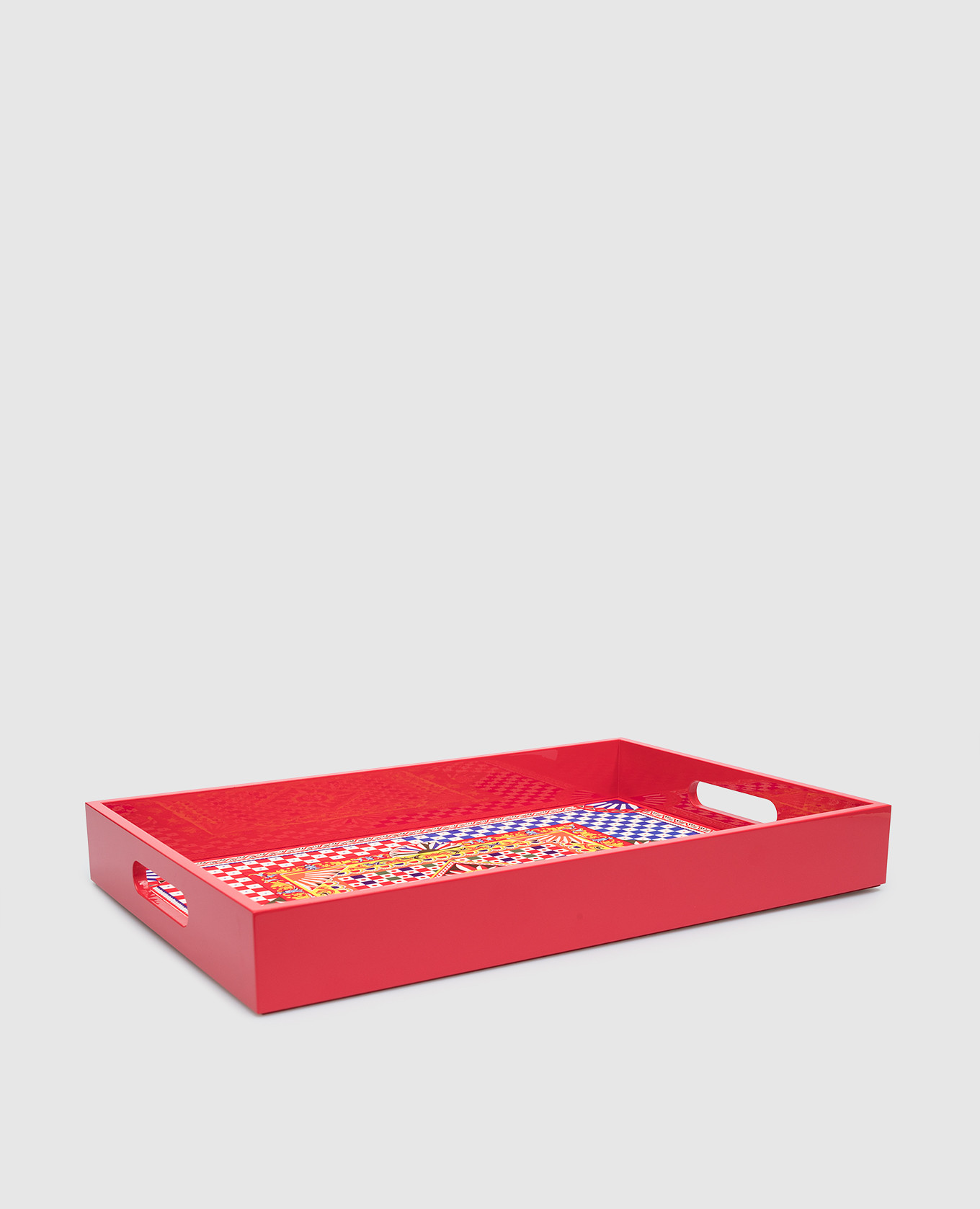 Red wooden tray with a geometric print