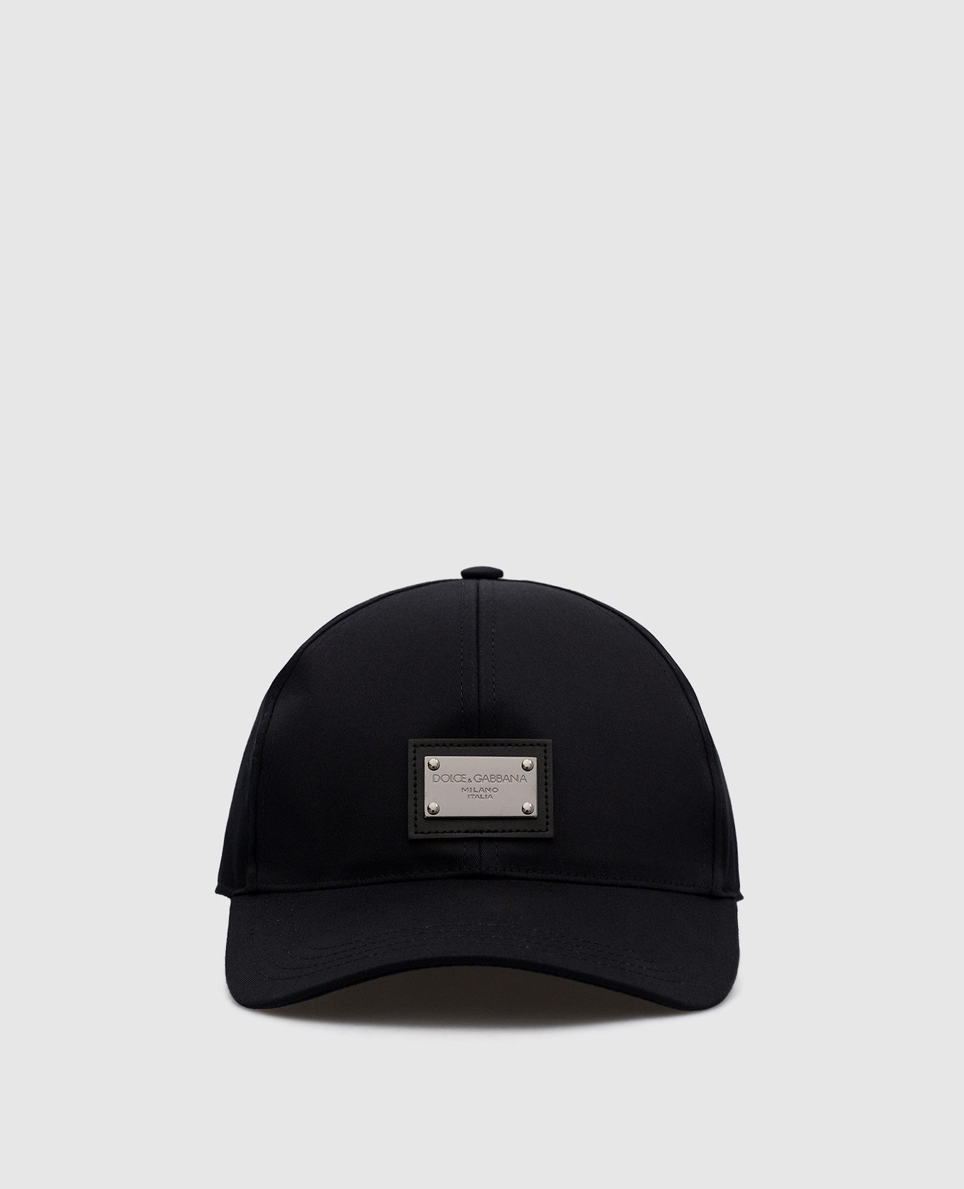 Black cap with metal logo patch
