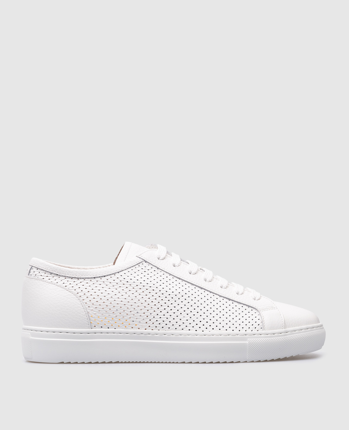 White leather sneakers with perforation