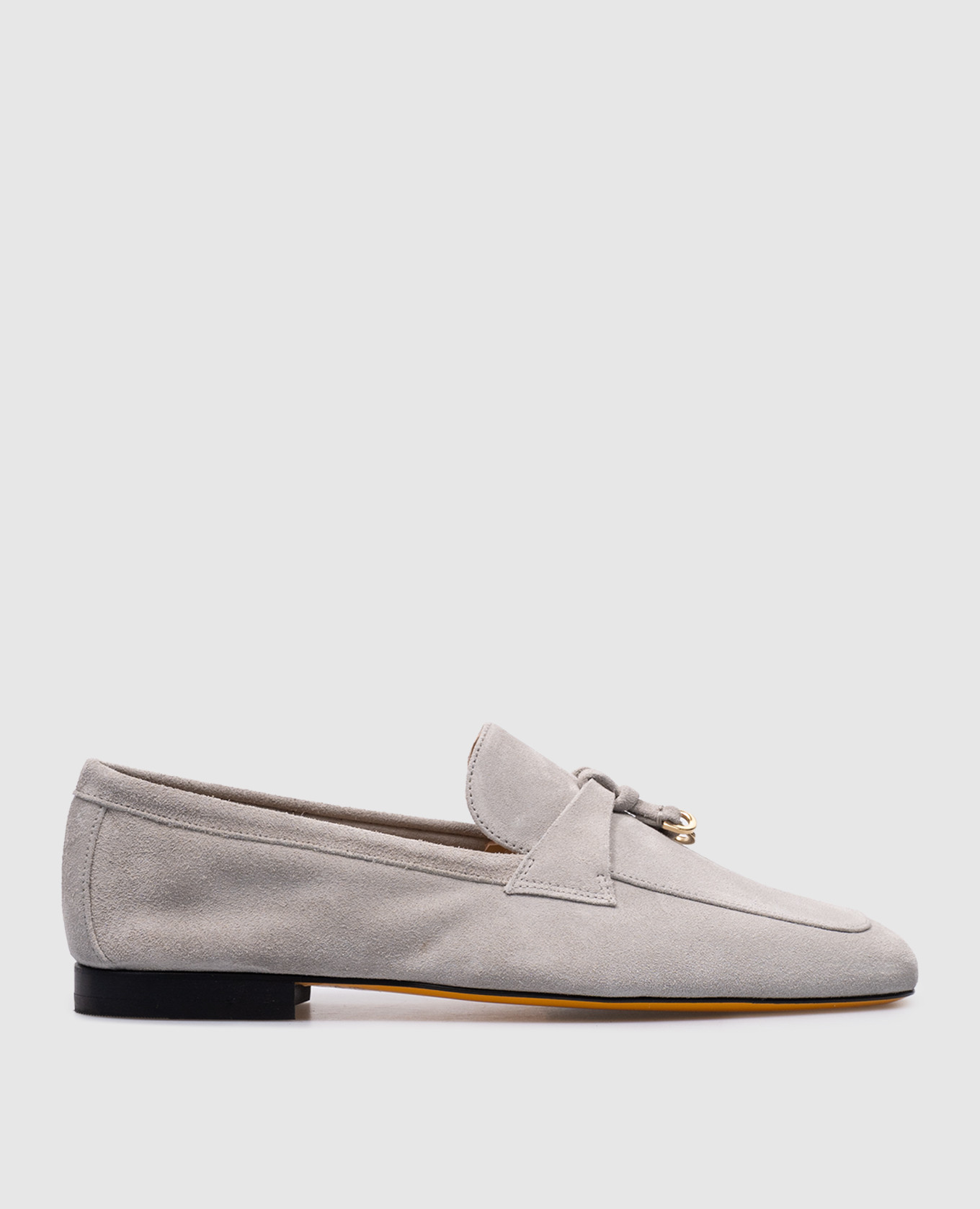 Gray suede loafers with metal pendants