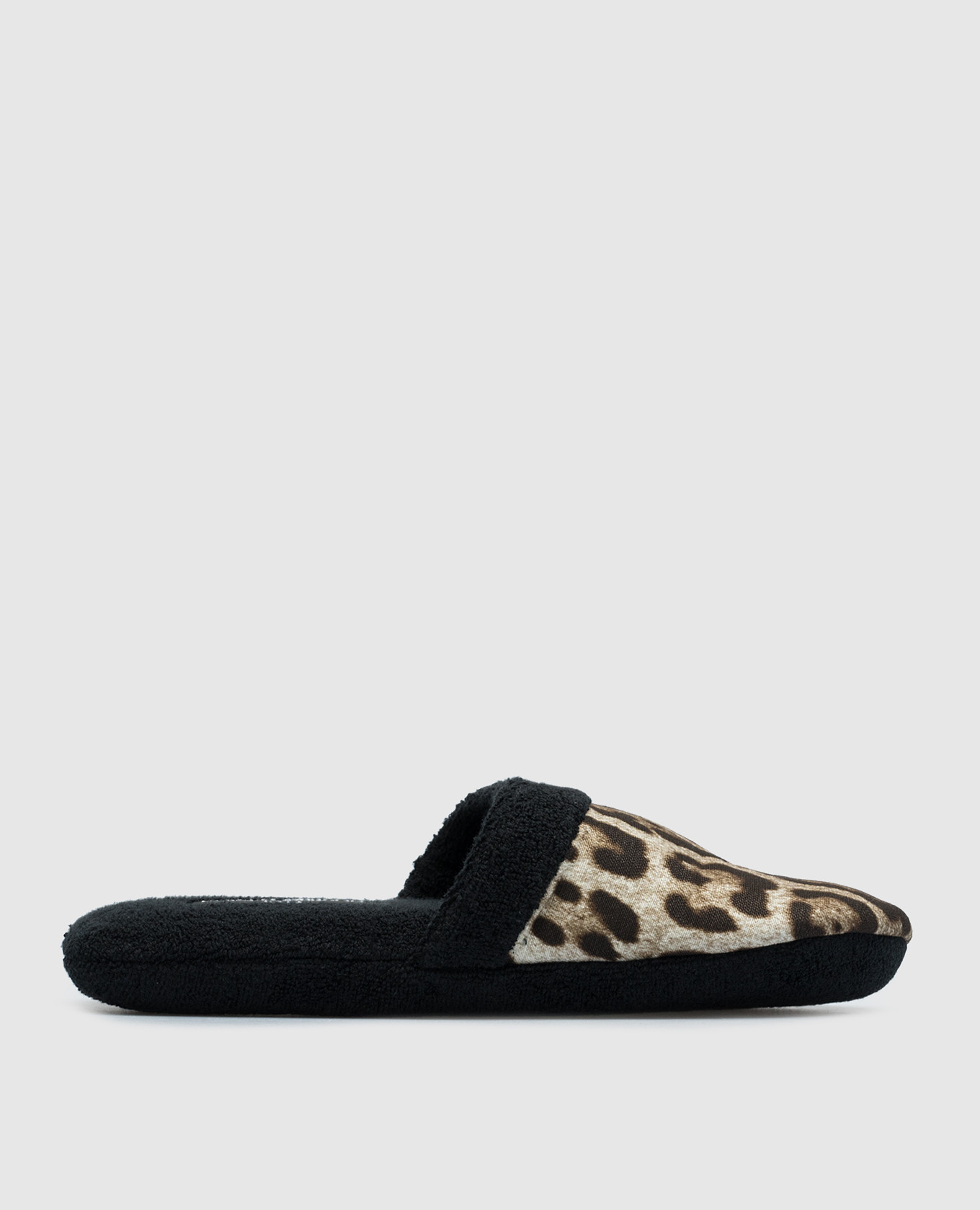 Black slippers in an animalistic print