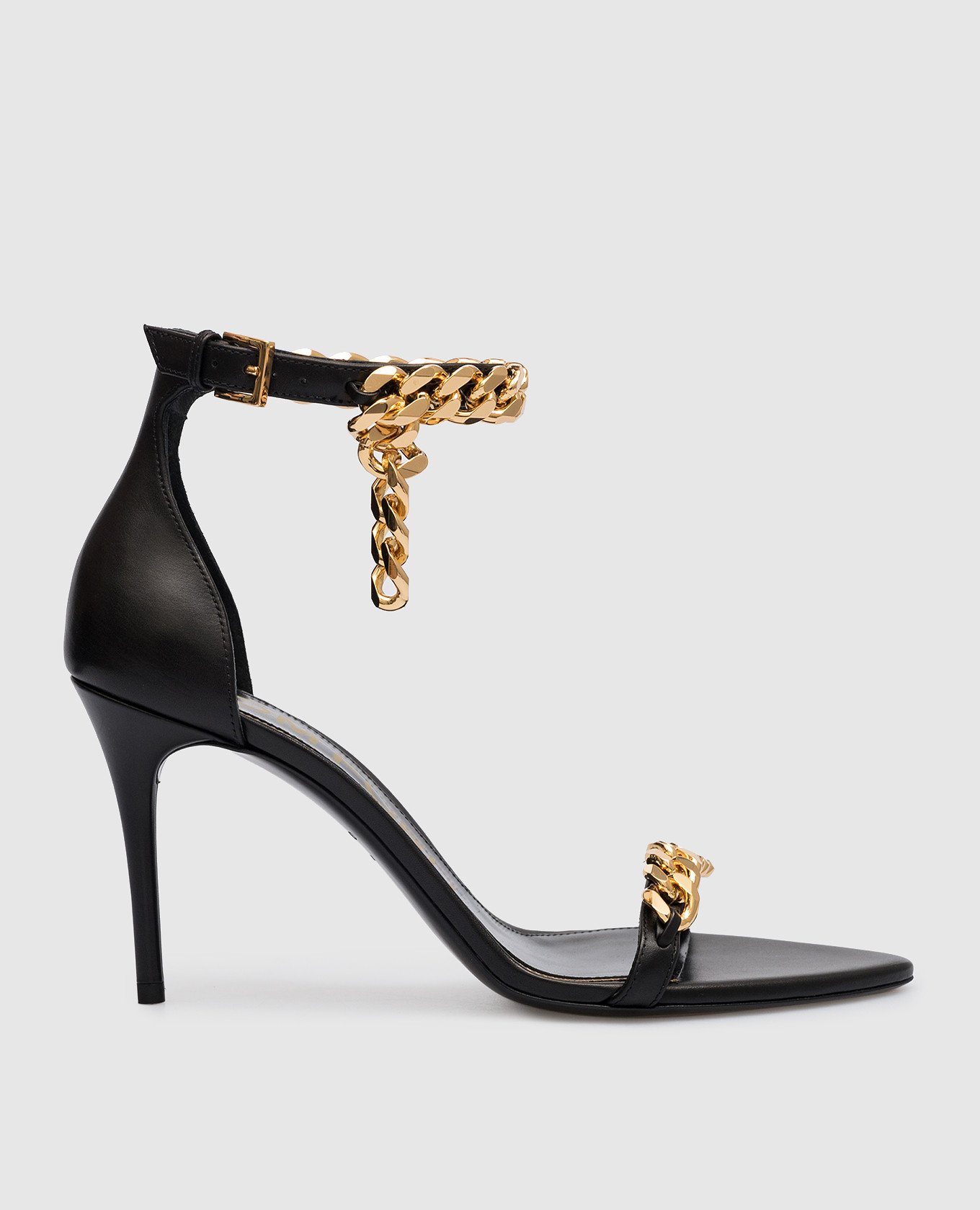 Black leather sandals with a chain