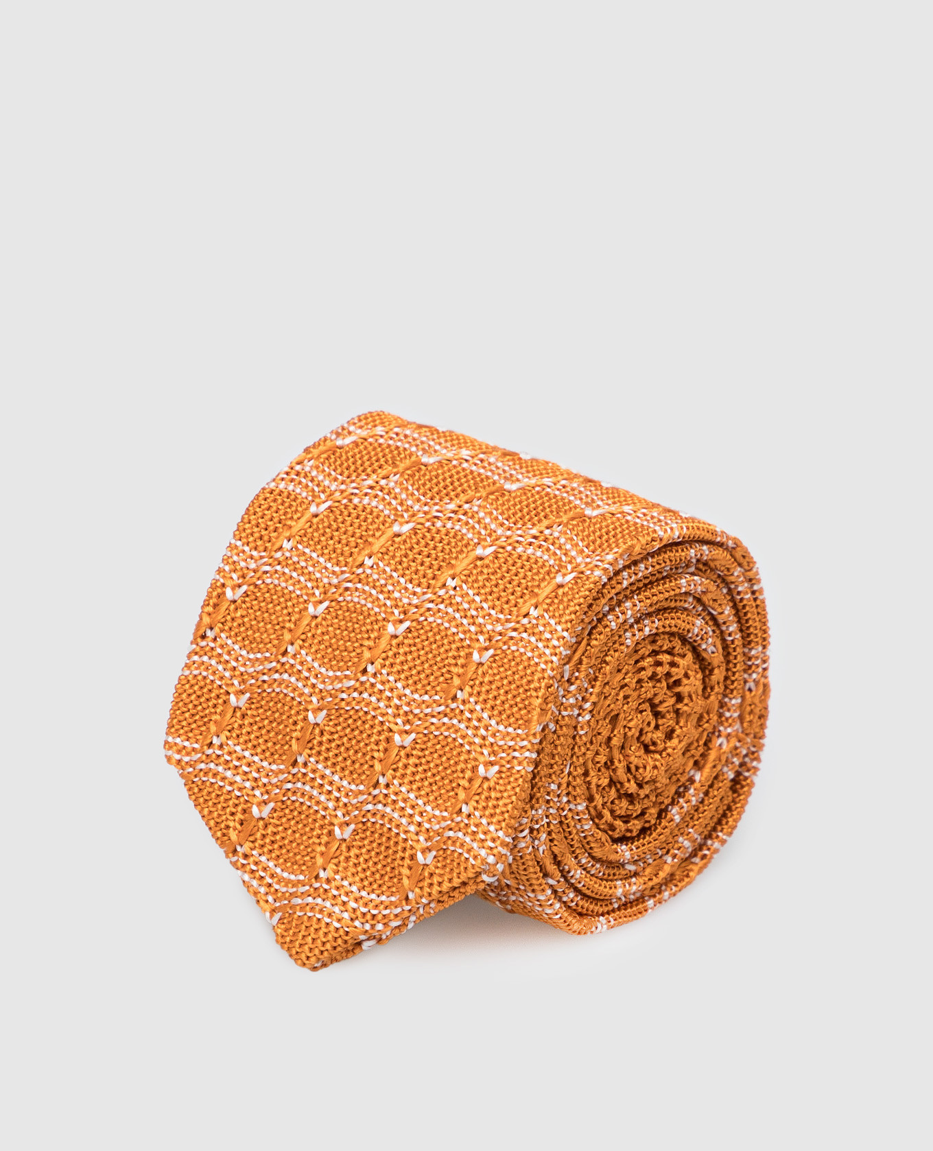 Children's orange silk tie in a geometric pattern