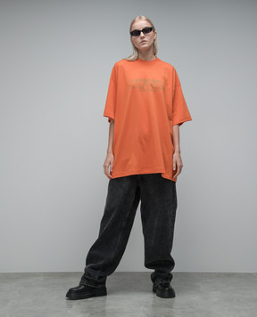 Vetements Помаранчева футболка з принтом логотипа UE54TR330O