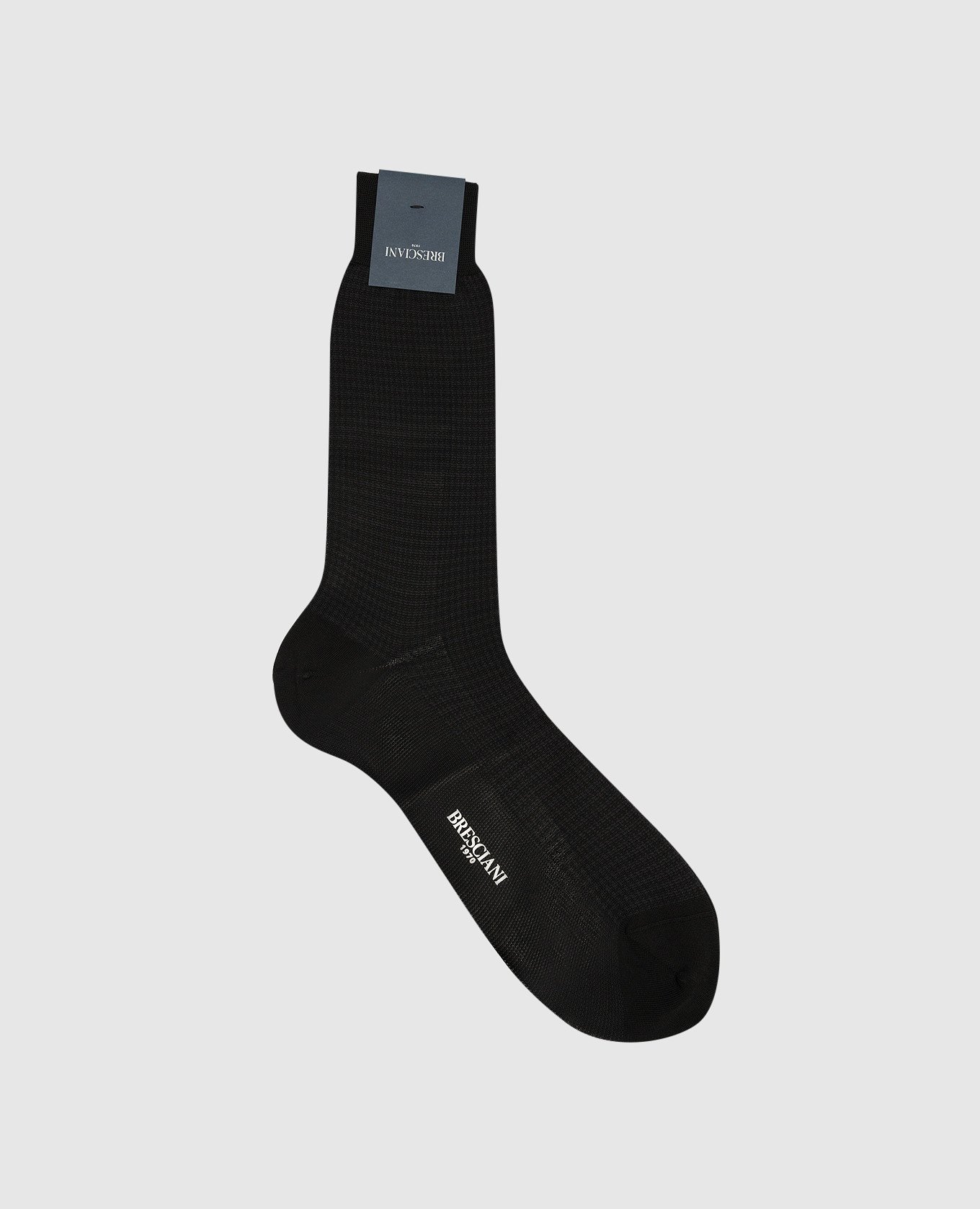 Black socks in a houndstooth pattern