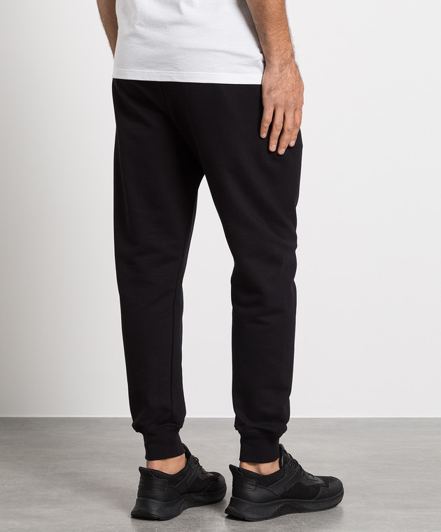 Black joggers with contrasting McQueen Graffiti print