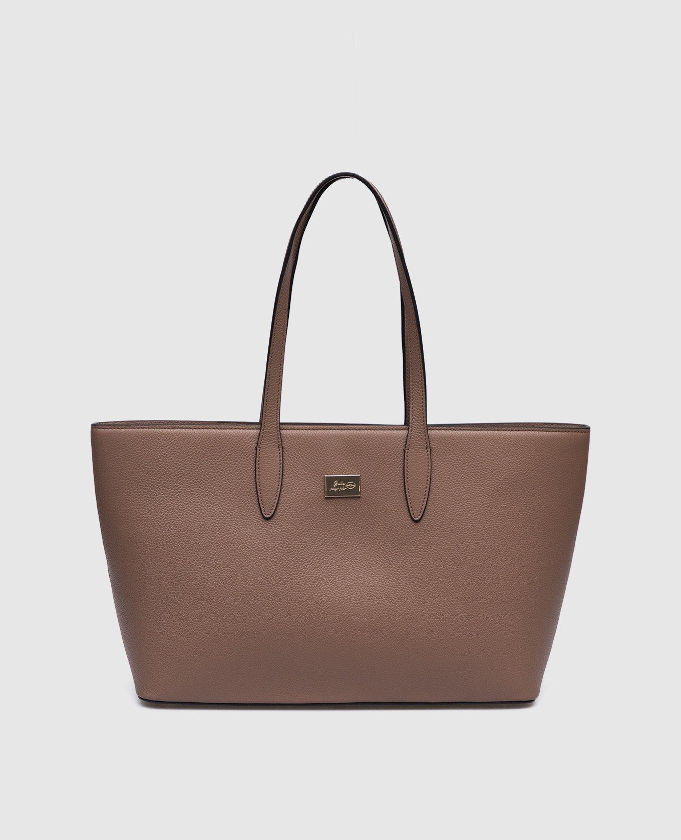 Brown leather trapeze bag