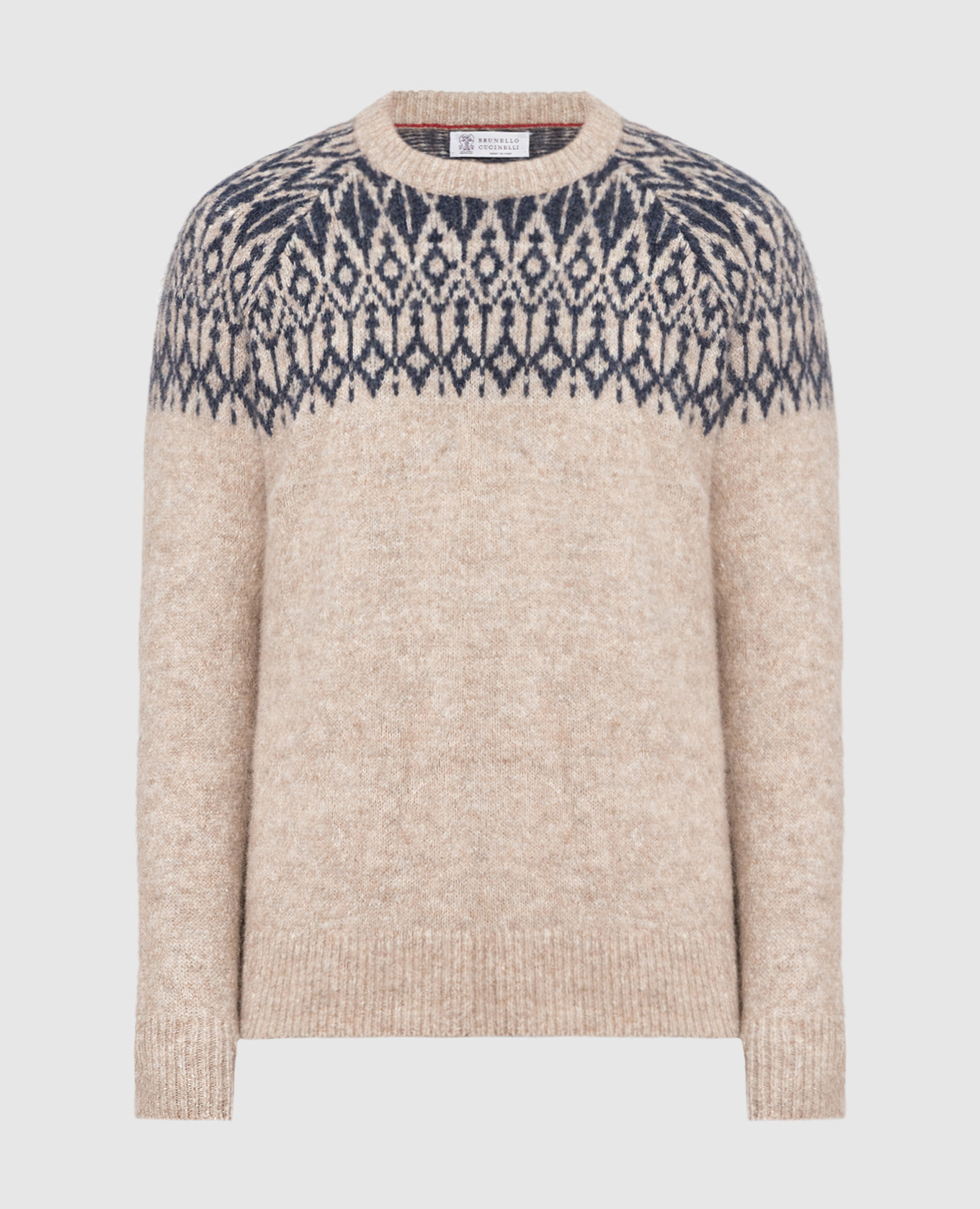 Beige sweater with a pattern
