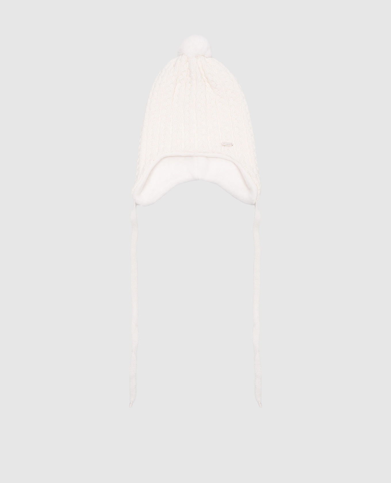 Children's white hat made of wool with a textured pattern