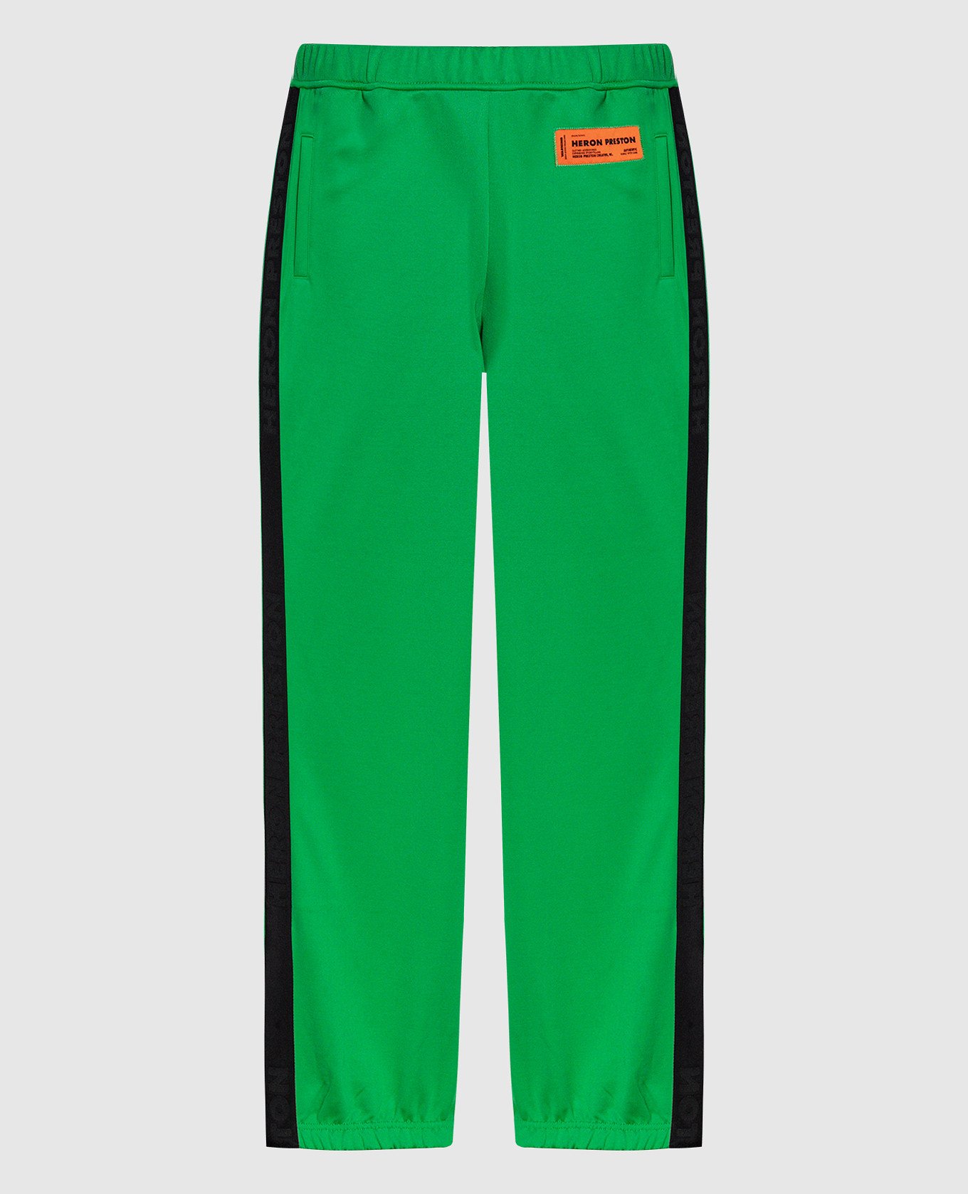 Зеленые спортивные брюки с логотипом