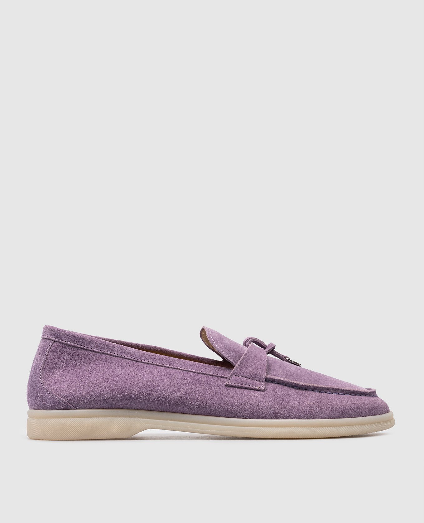 Purple suede loafers with metallic logo