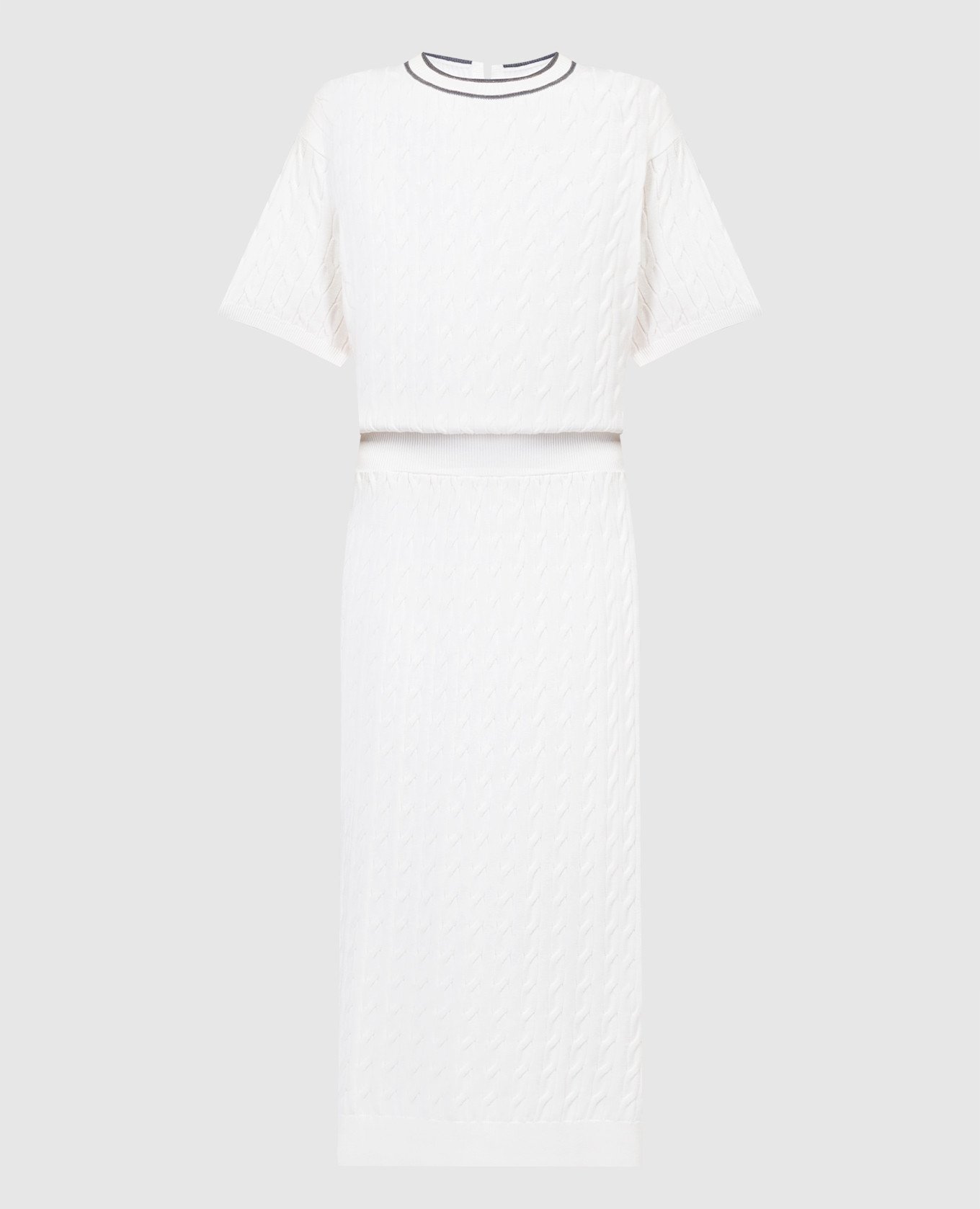 White dress in a textured pattern with a monil chain