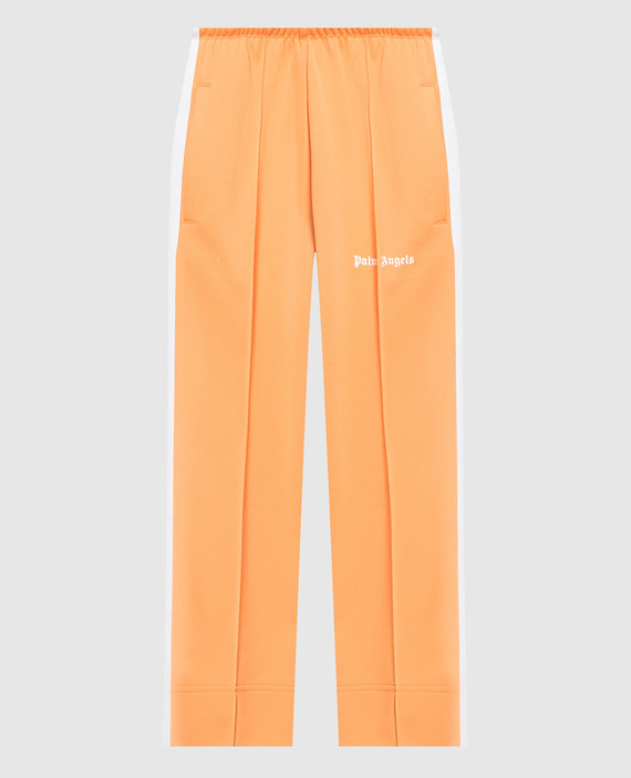 Оранжевые спортивные штаны с лампасами.