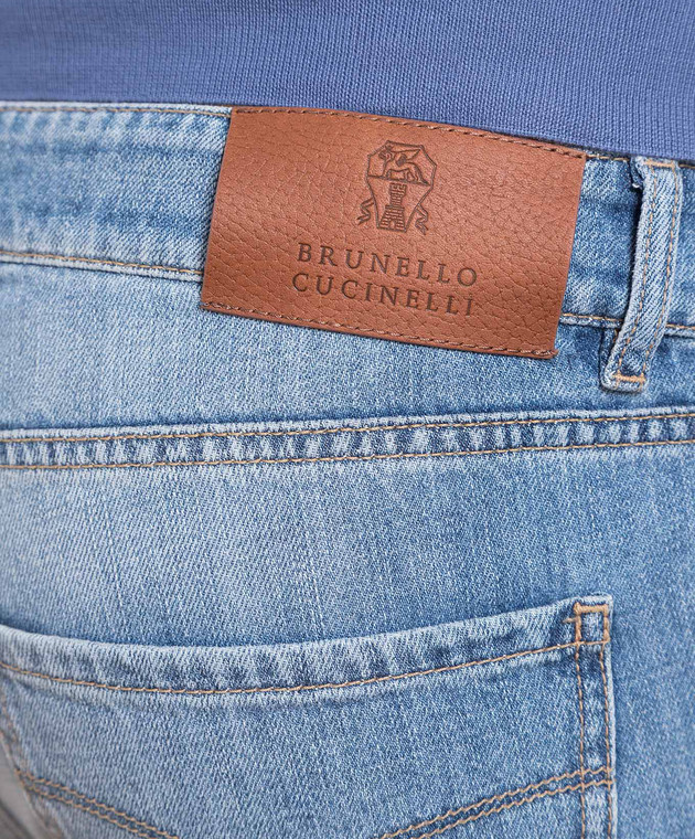 Brunello Cucinelli - Blue jeans with a distressed effect M0Z37D2210 ...