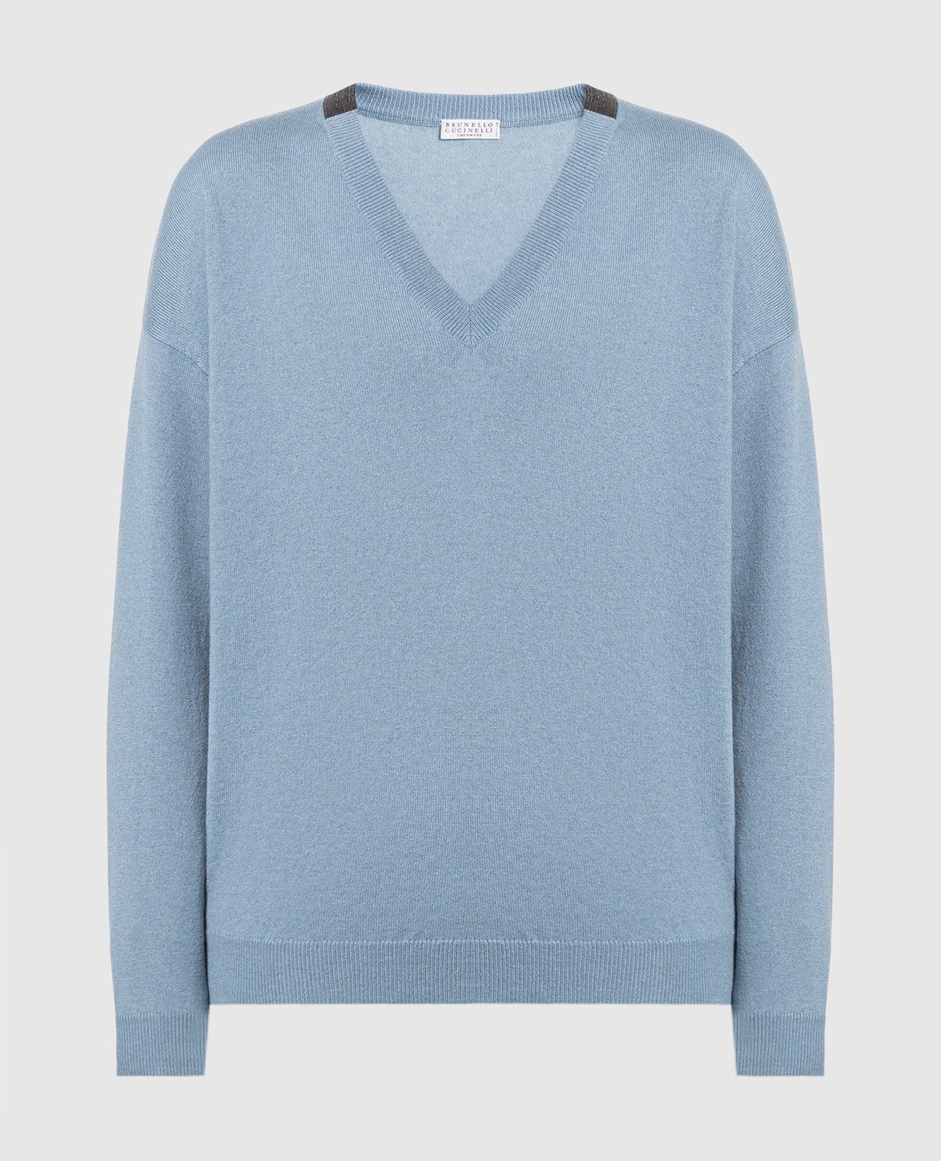 Blue cashmere pullover with eco-brass
