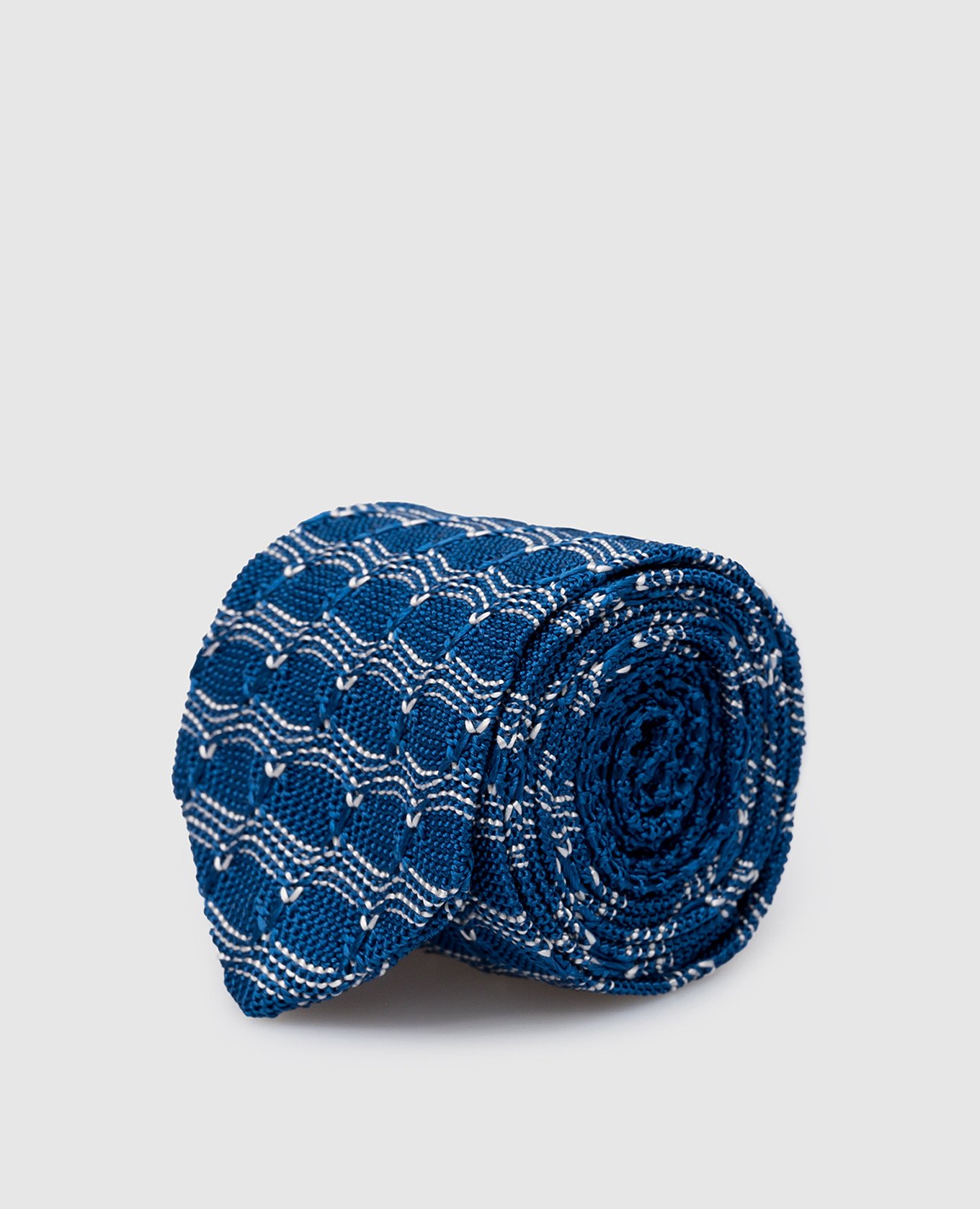Детский синий галстук из шелка в узор.