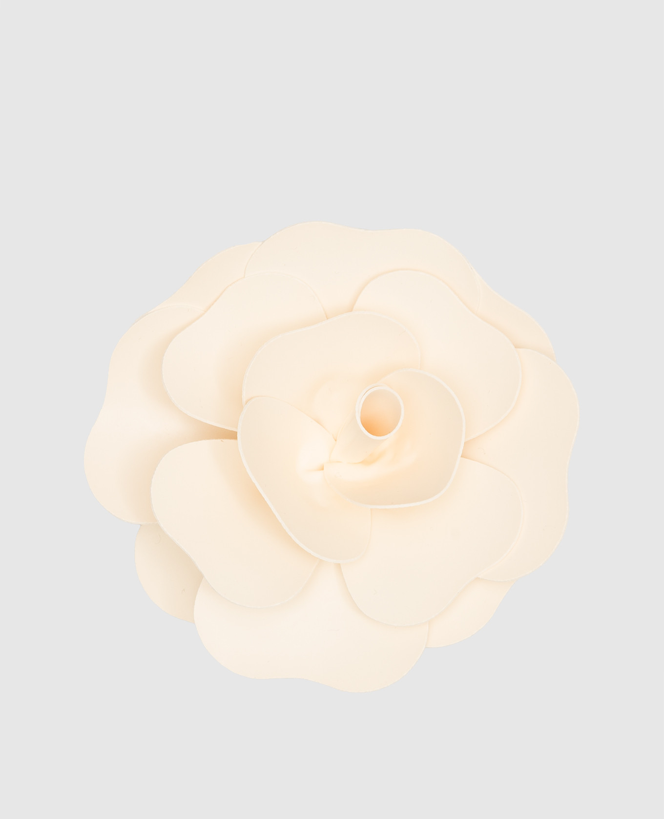 Beige brooch in the form of a flower