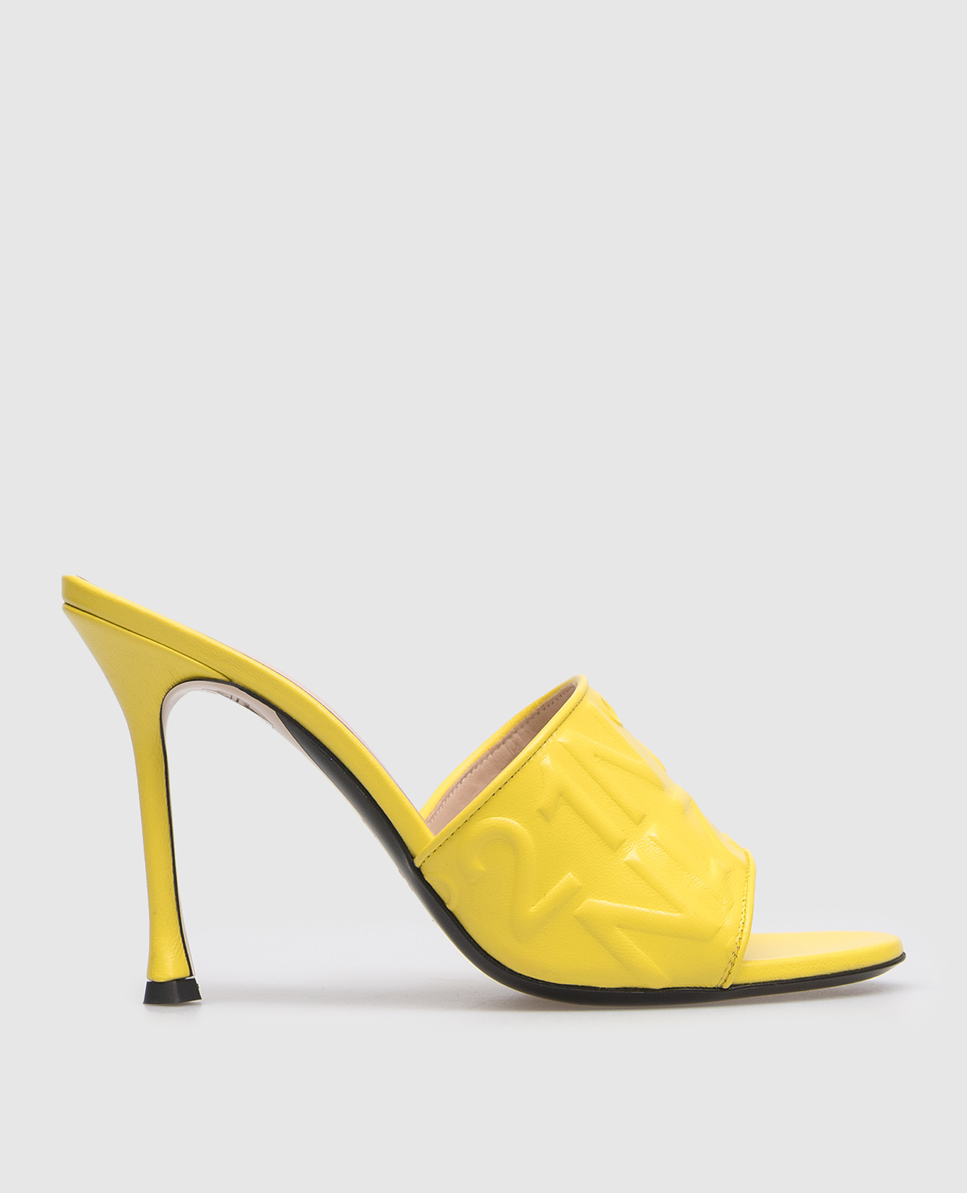 Yellow leather mules with embossed logo