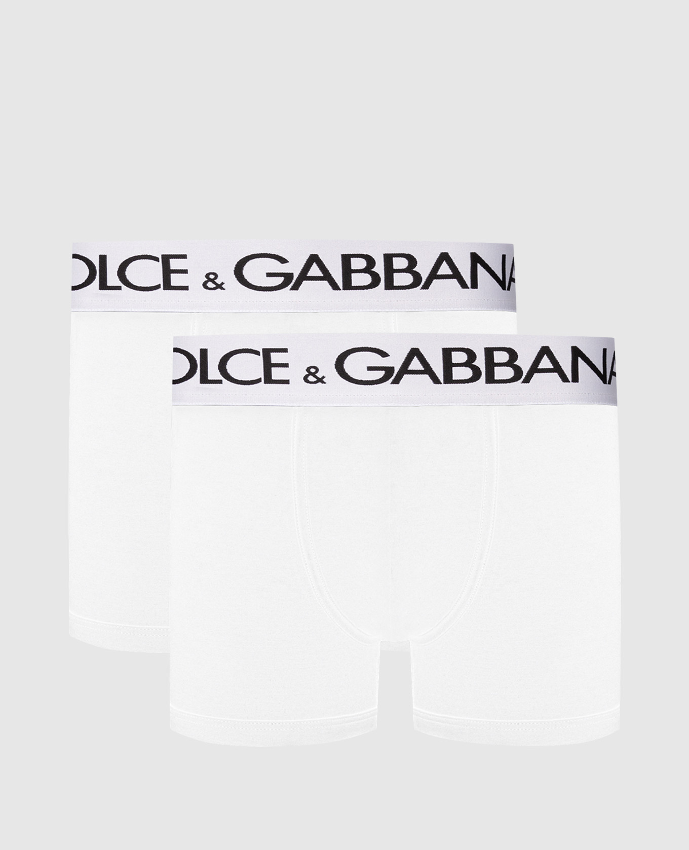 A set of white boxer briefs with a logo pattern