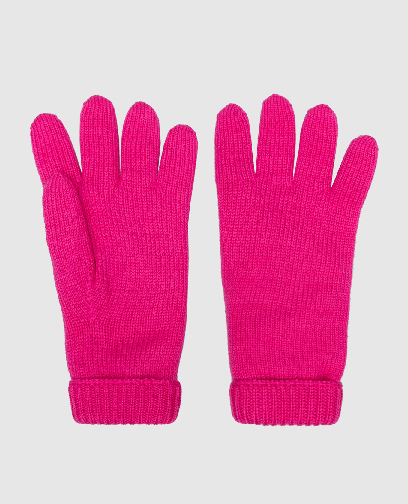 Children's pink mittens made of wool