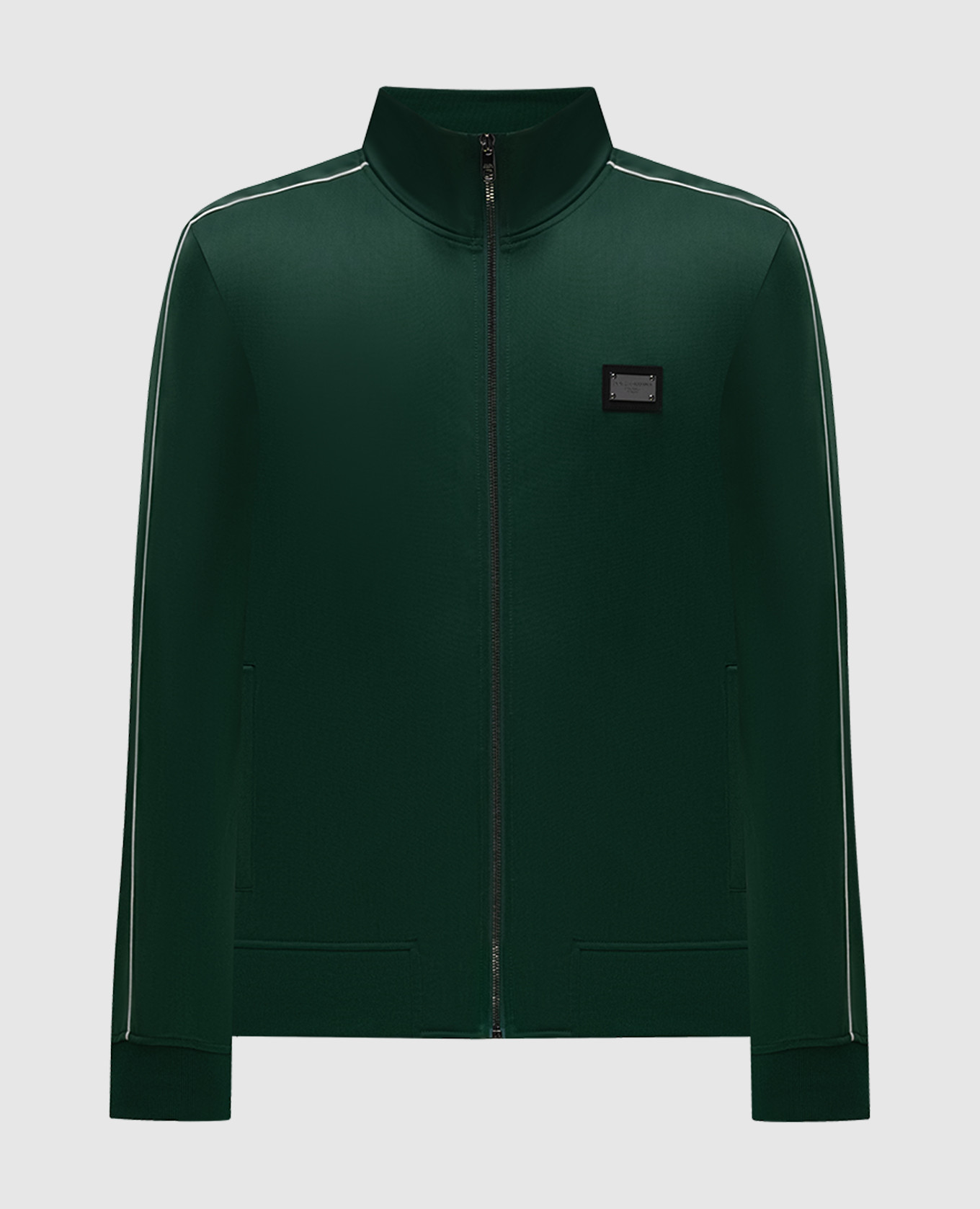Green sports jacket with a logo patch