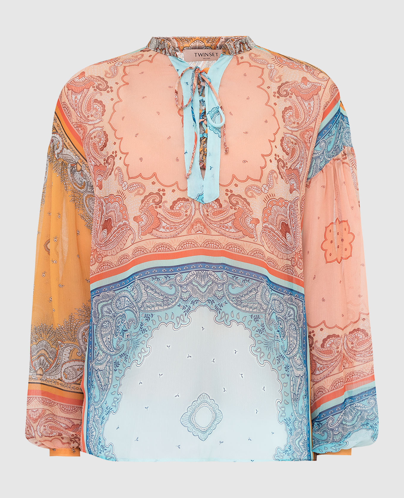 Персиковая блуза в узор