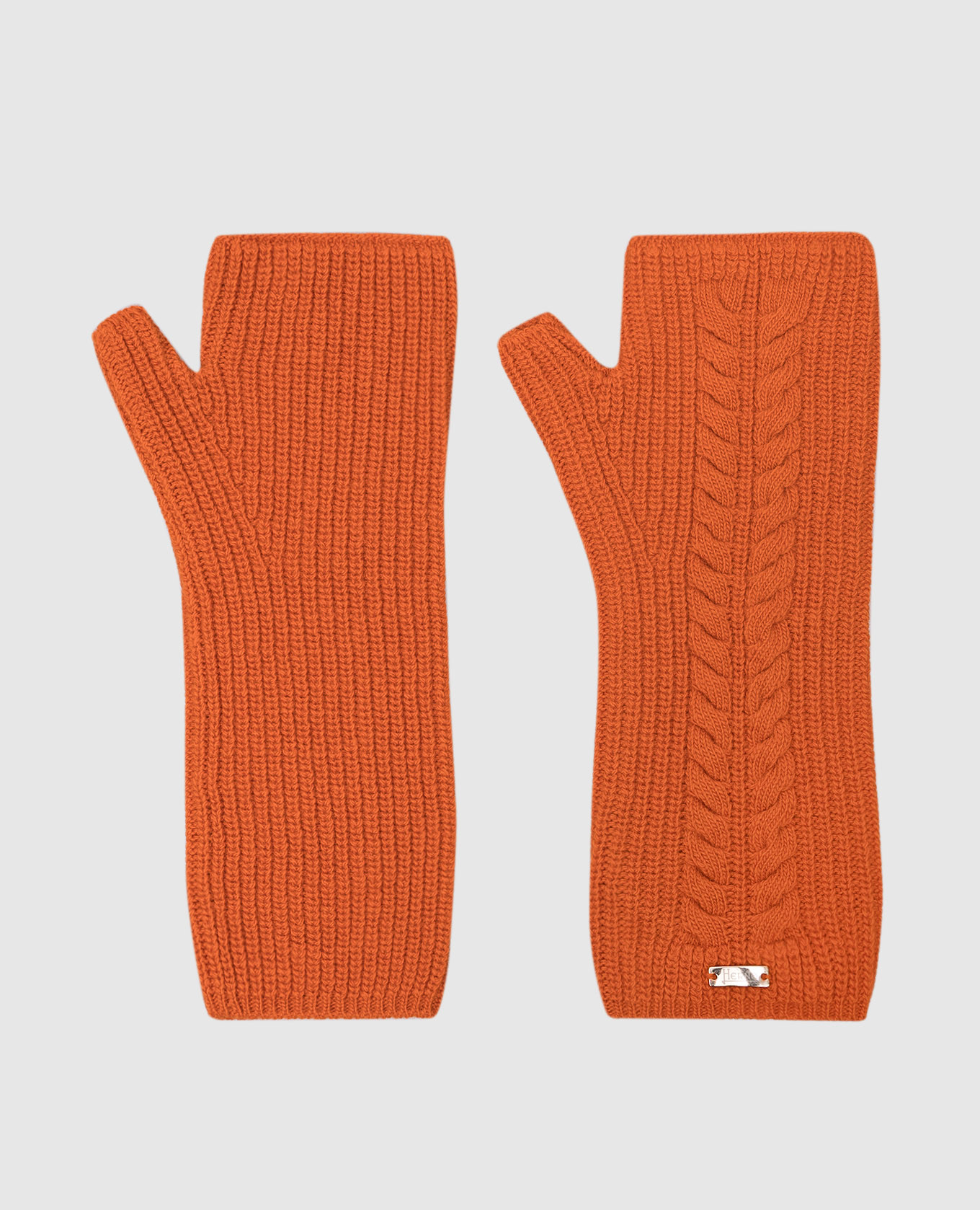 Orange mittens made of wool with a textured pattern