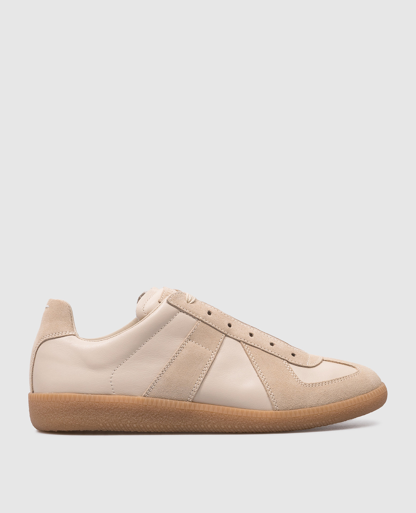 Beige leather sneakers with embossed logo