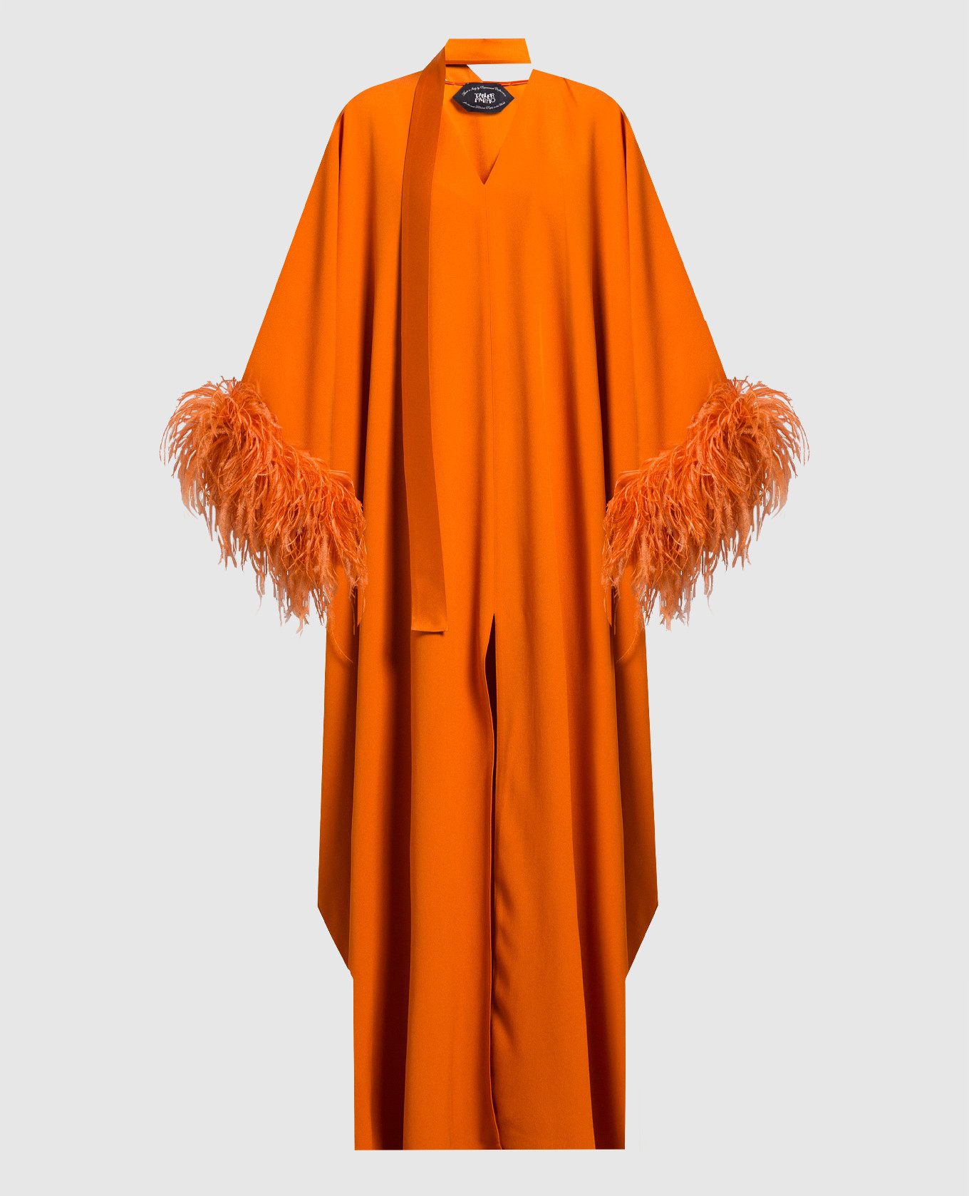 Оранжевое платье с перьями страуса