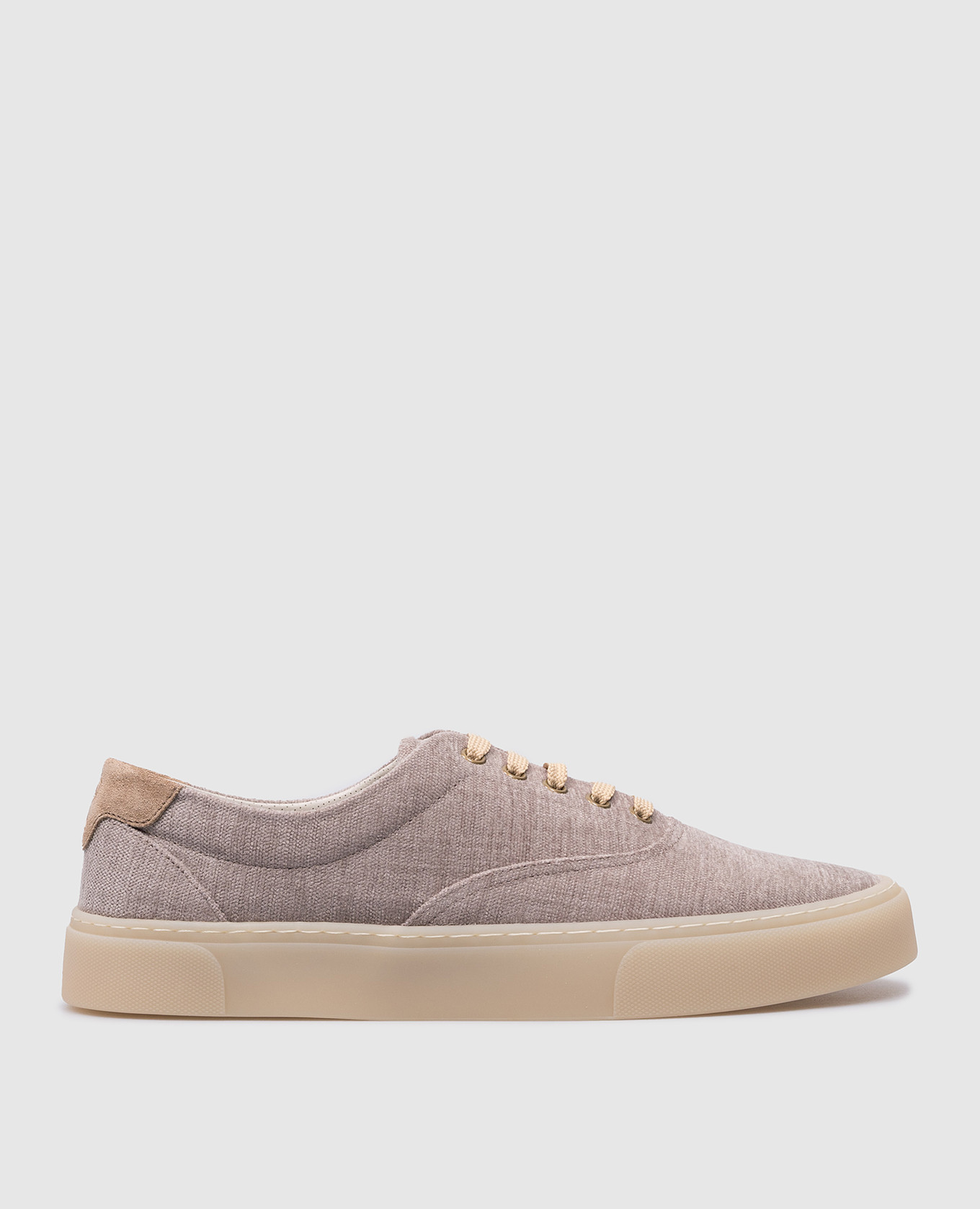 Beige sneakers with a logo
