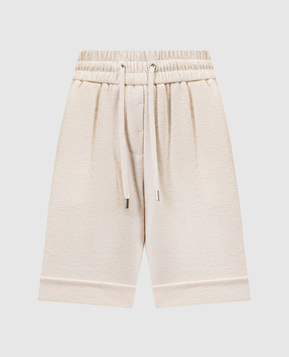 Beige shorts with monil chain