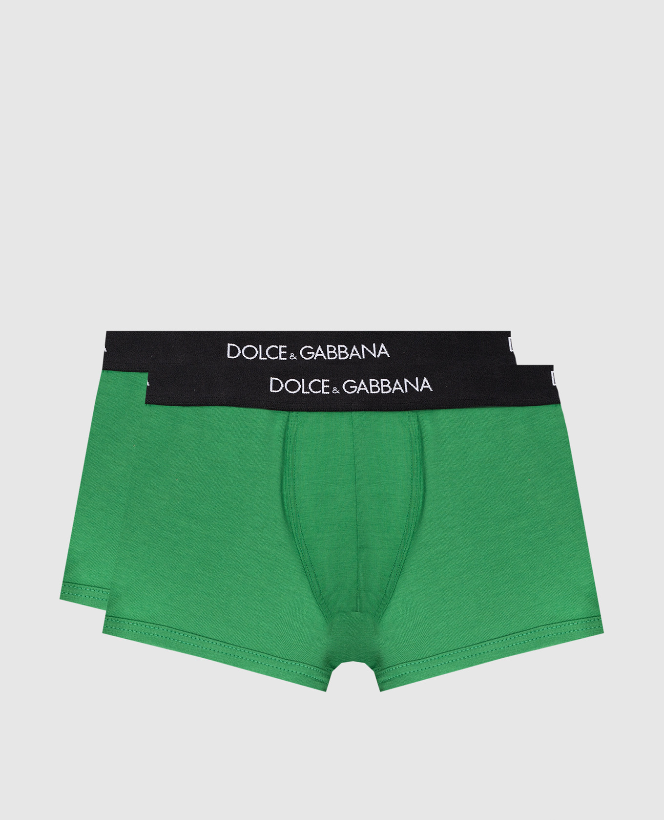 Green boxer briefs with a logo pattern