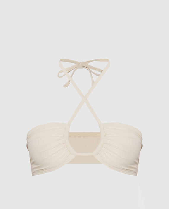 Beige bodice from a swimsuit