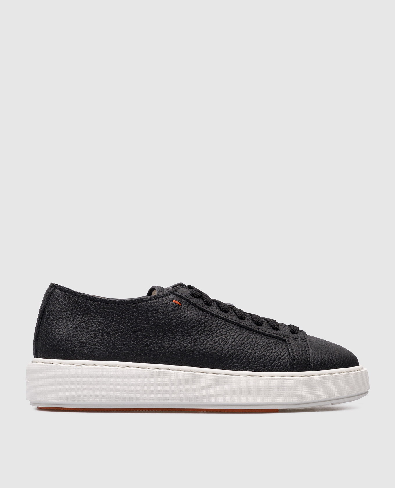 Black leather sneakers with textured logo