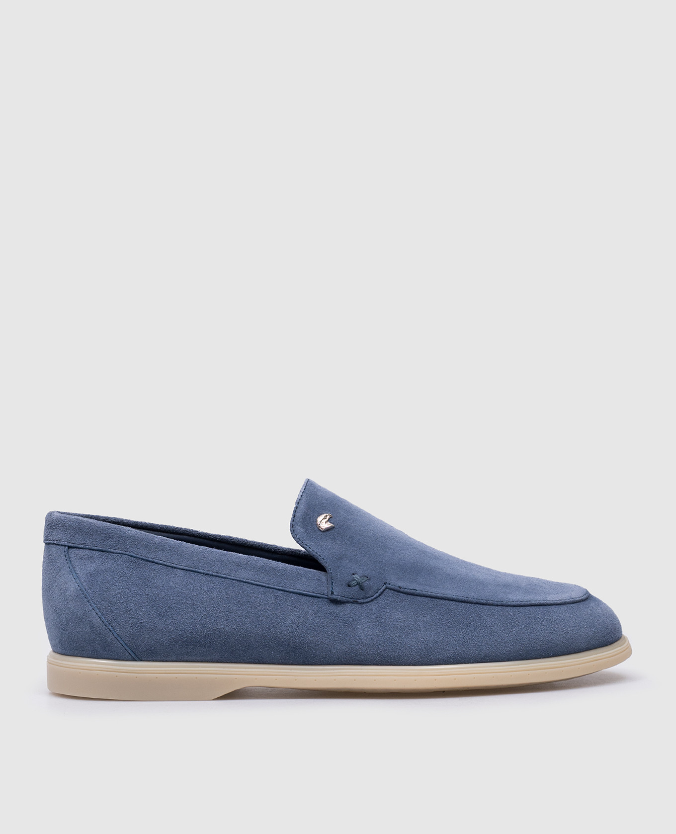 Blue suede loafers with metal logo