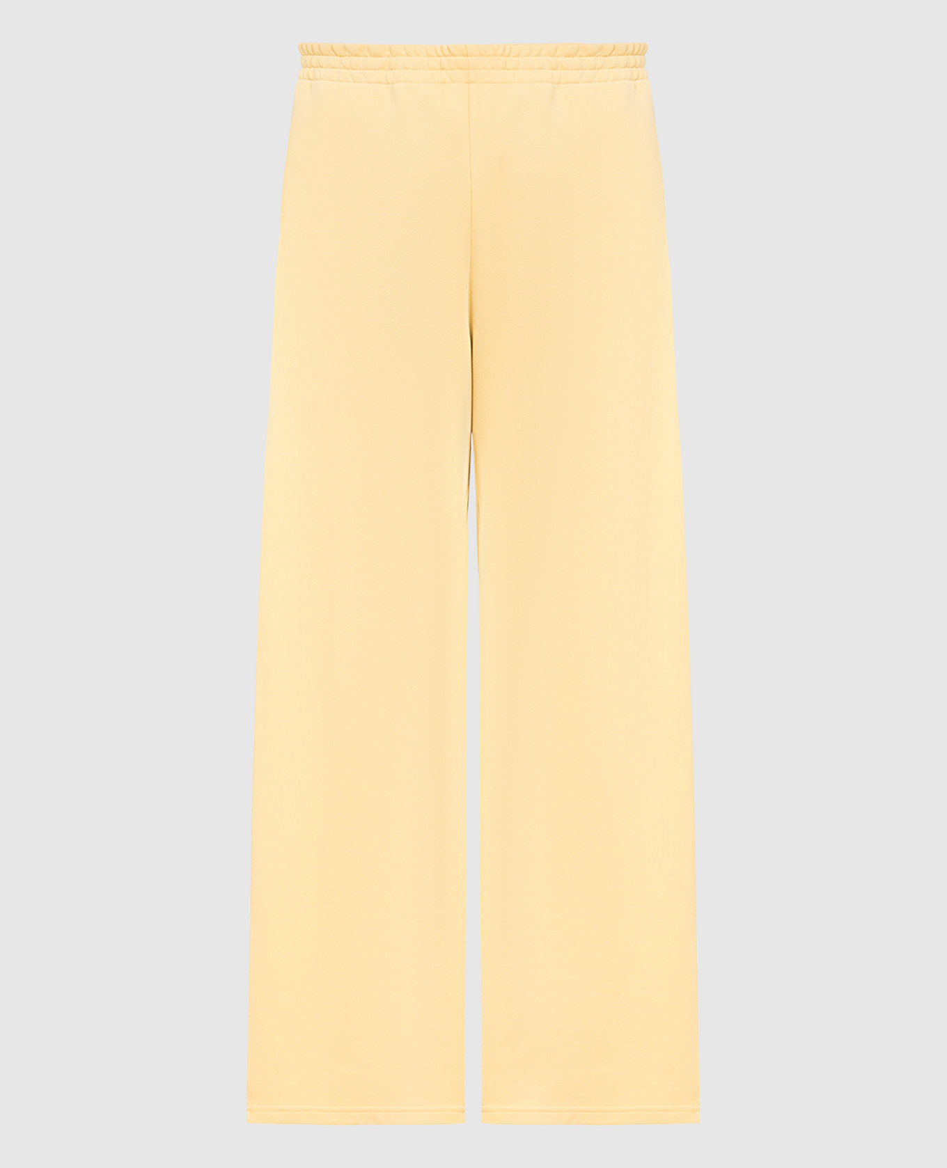 Желтые спортивные брюки