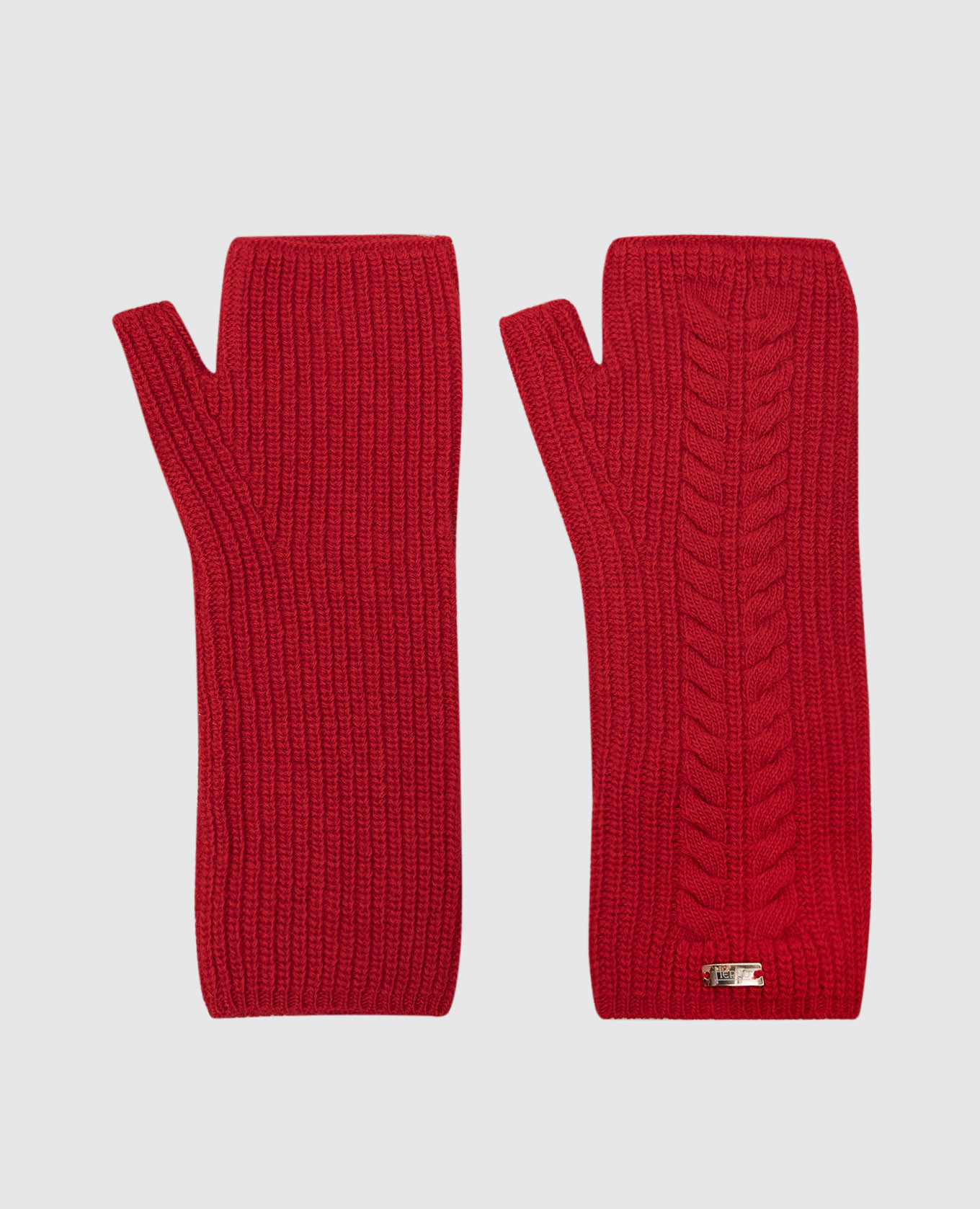 Red mittens made of wool with a textured pattern
