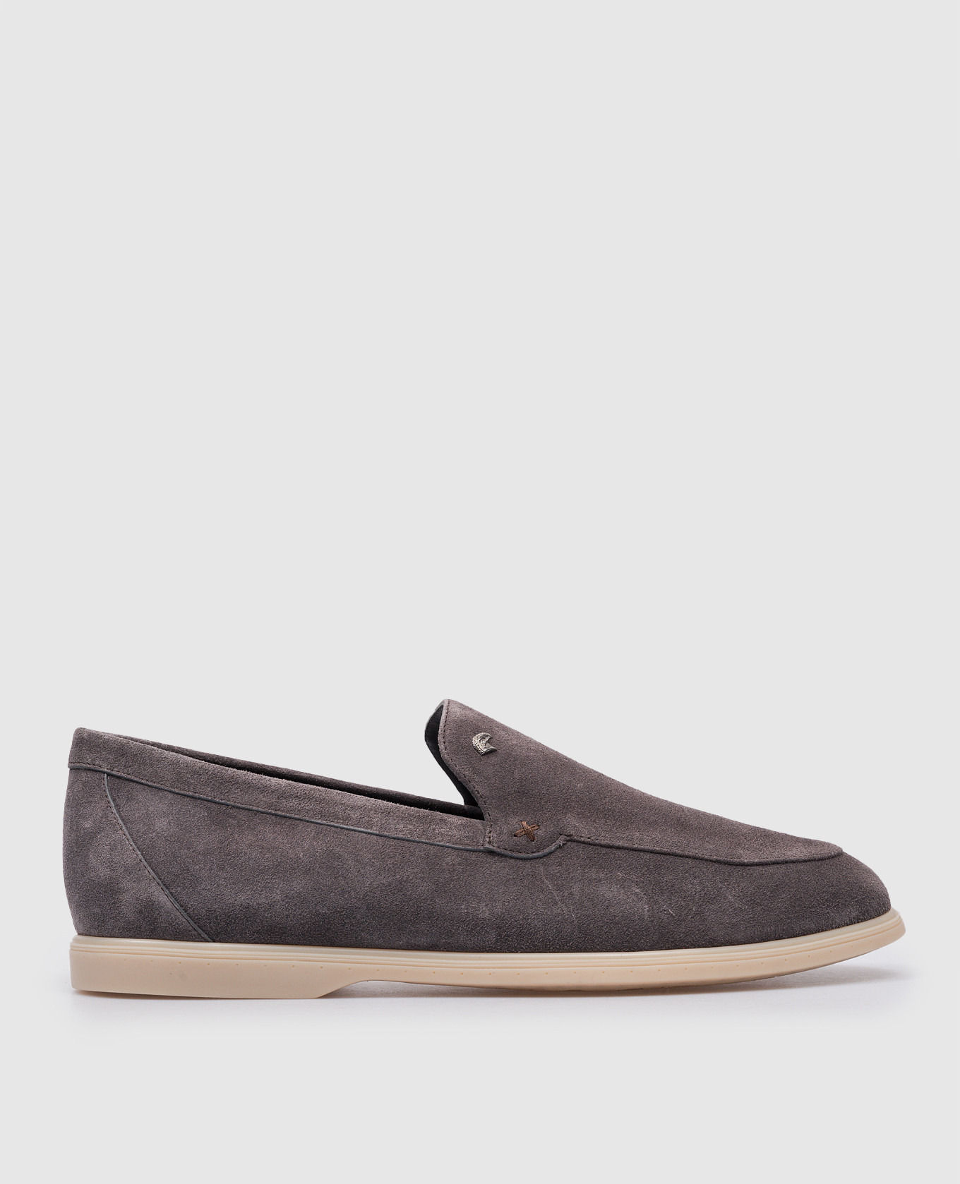 Gray suede loafers with metallic logo