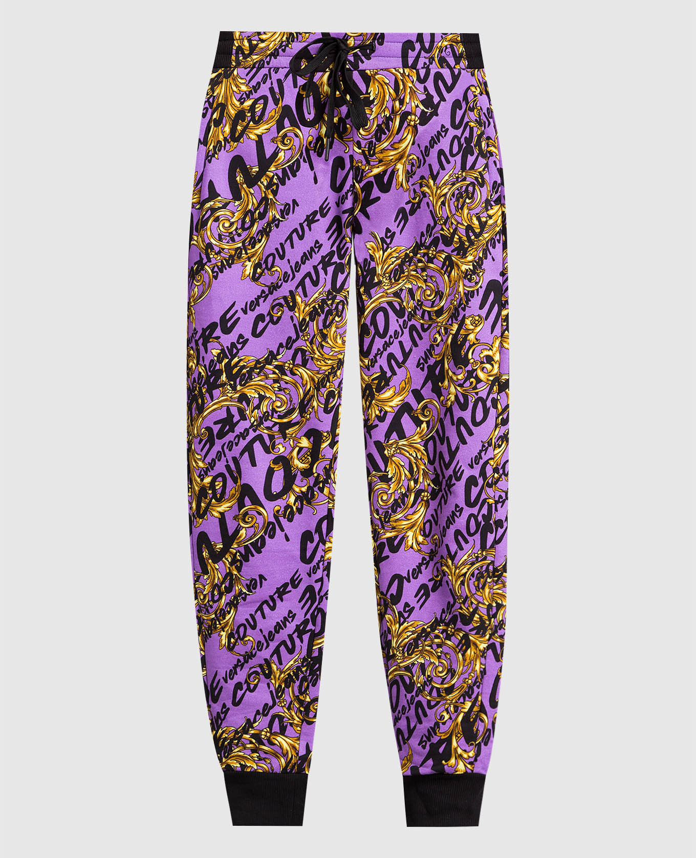 Purple joggers in Logo Brush Couture pattern