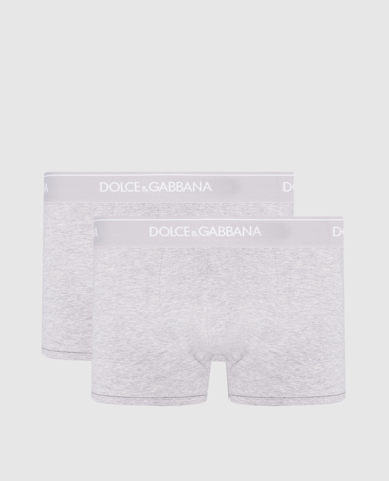 A set of gray boxer briefs with a logo pattern
