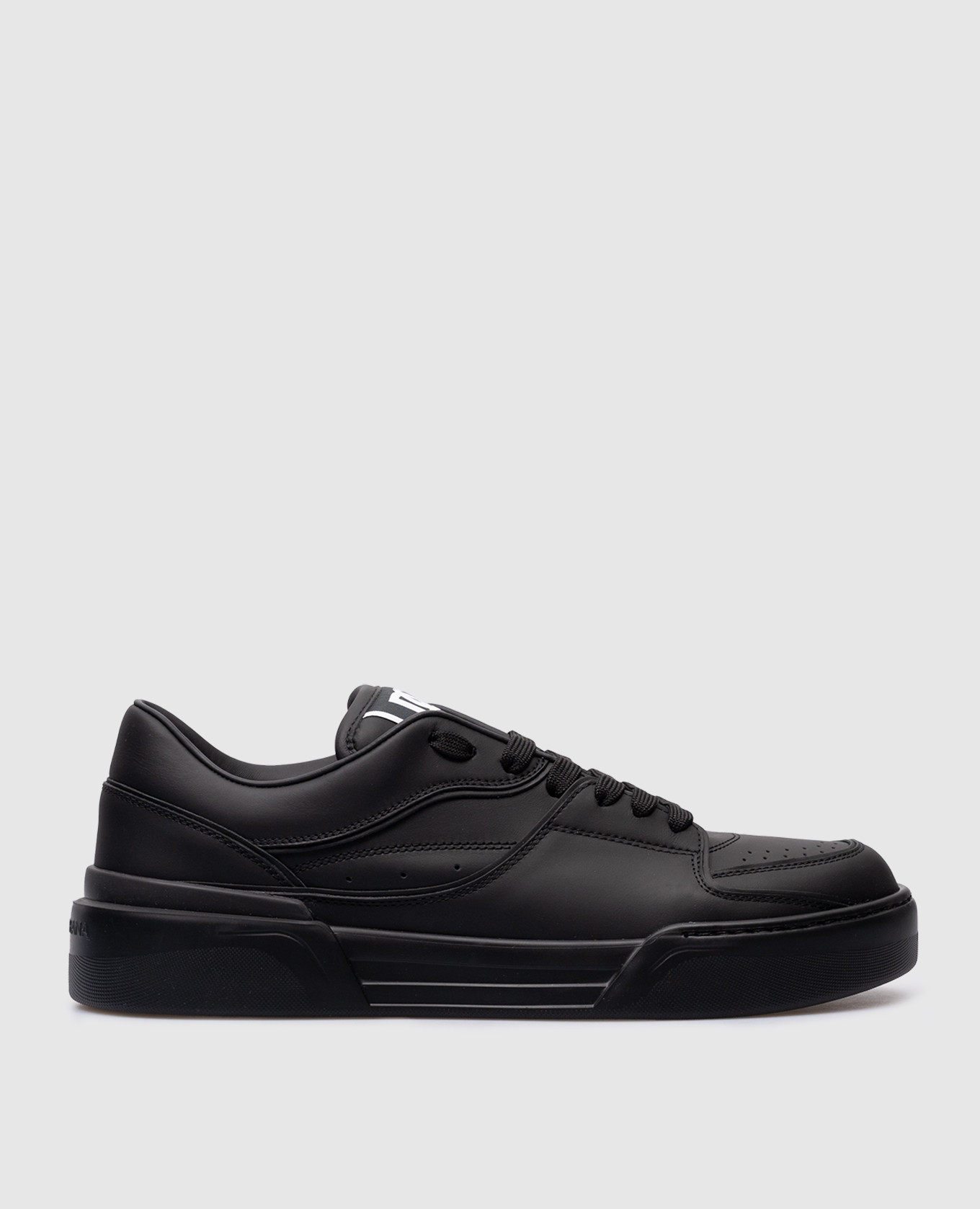 Black leather sneakers from New Roma with a logo patch