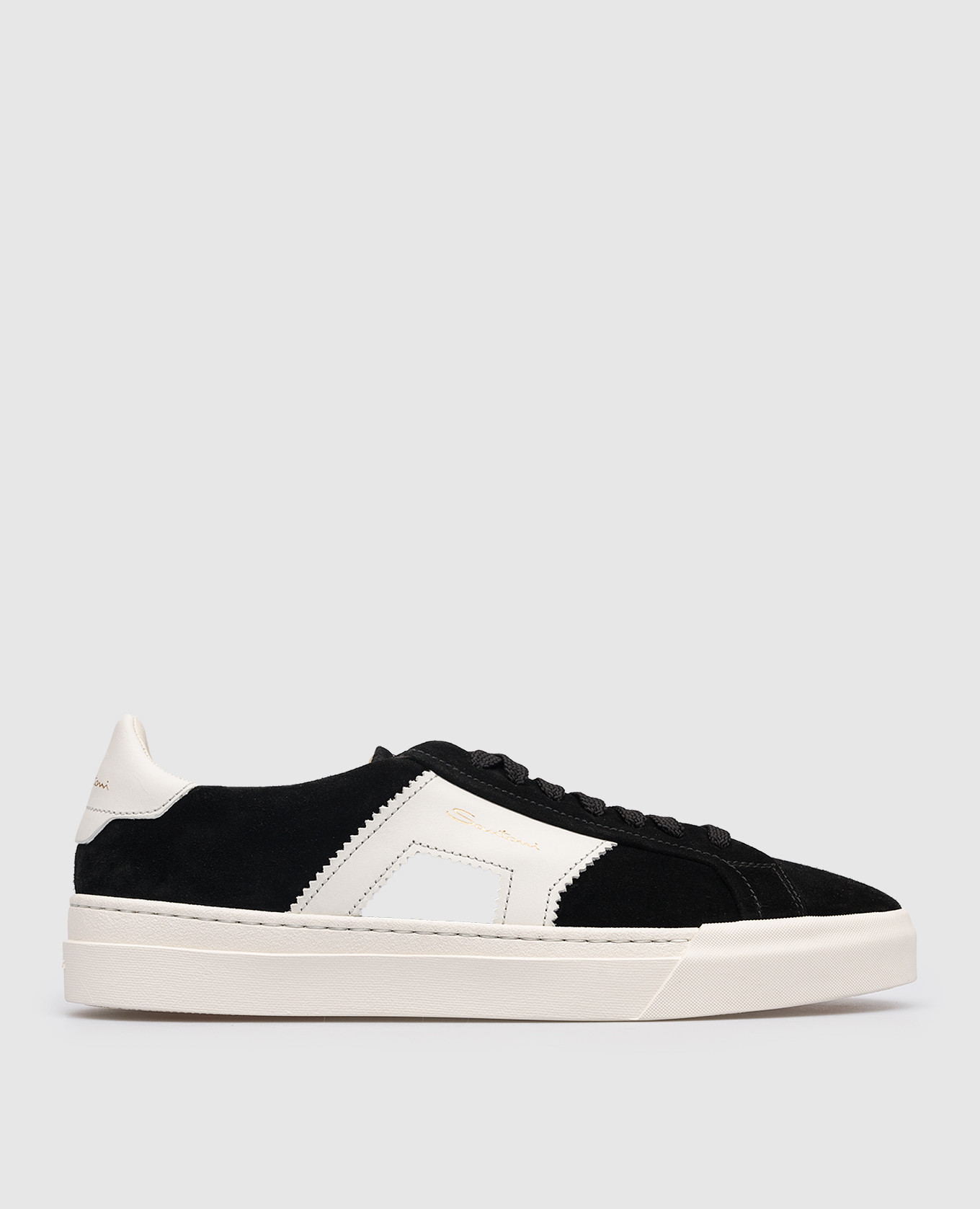 Black suede sneakers with embossed logo