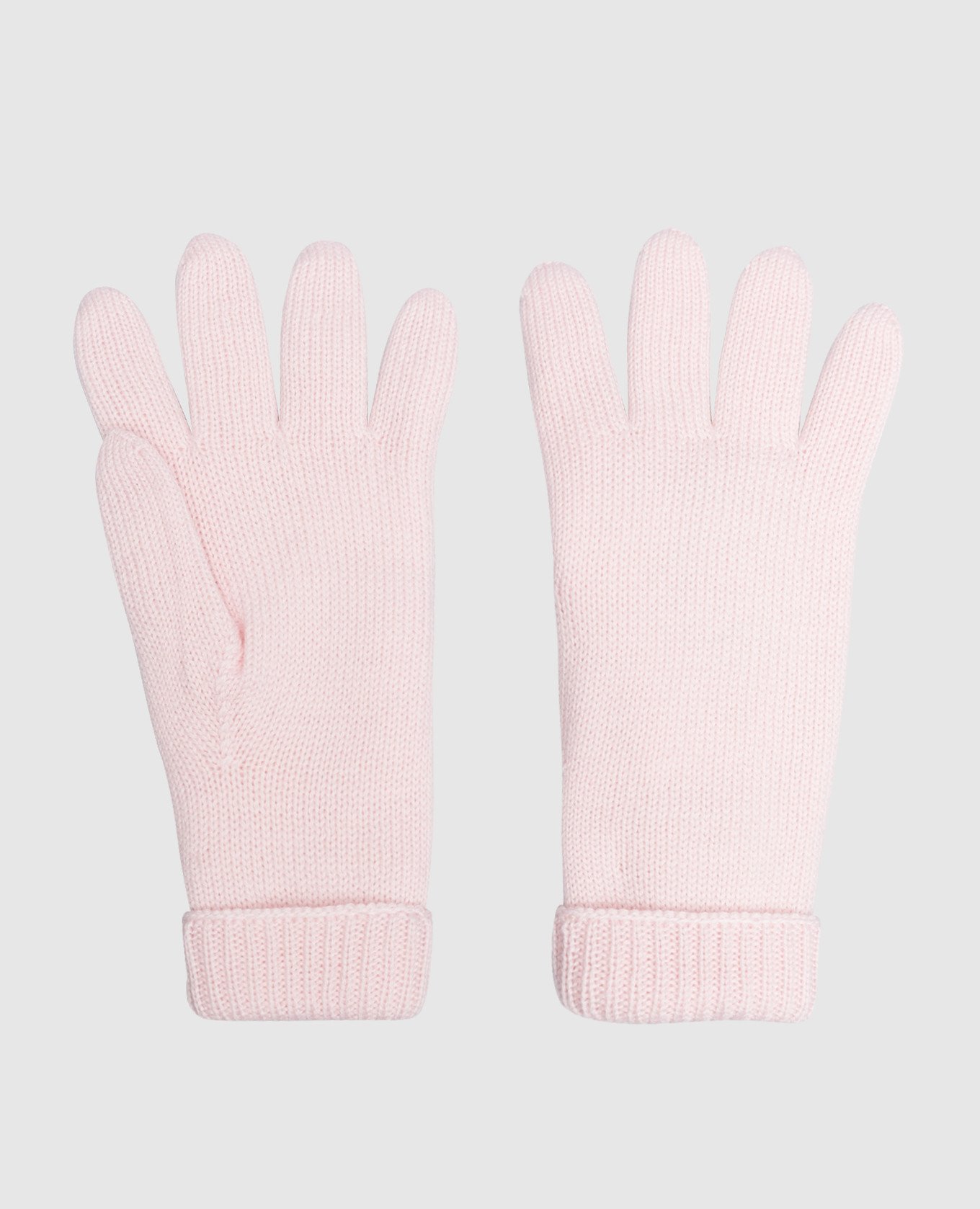 Children's pink mittens made of wool